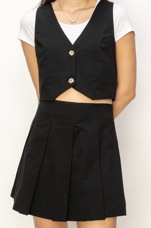 Set Falda corta y Chaleco Negro