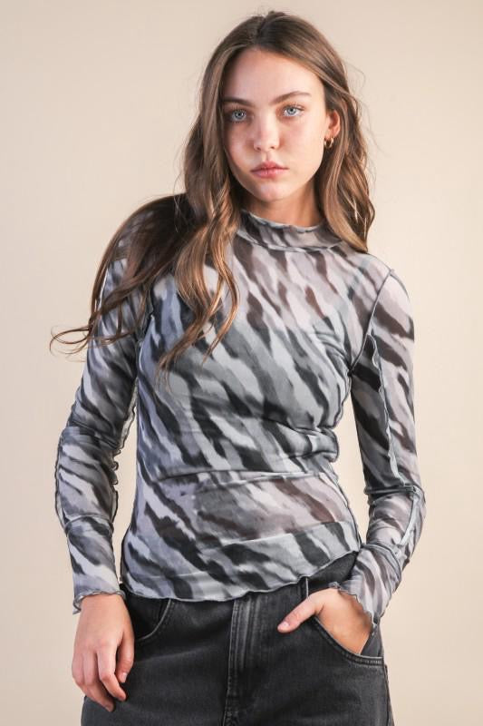 Blusa mesh costuras animal print