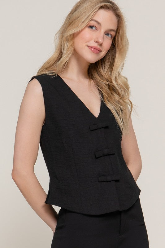 Chaleco broches lazos Negro