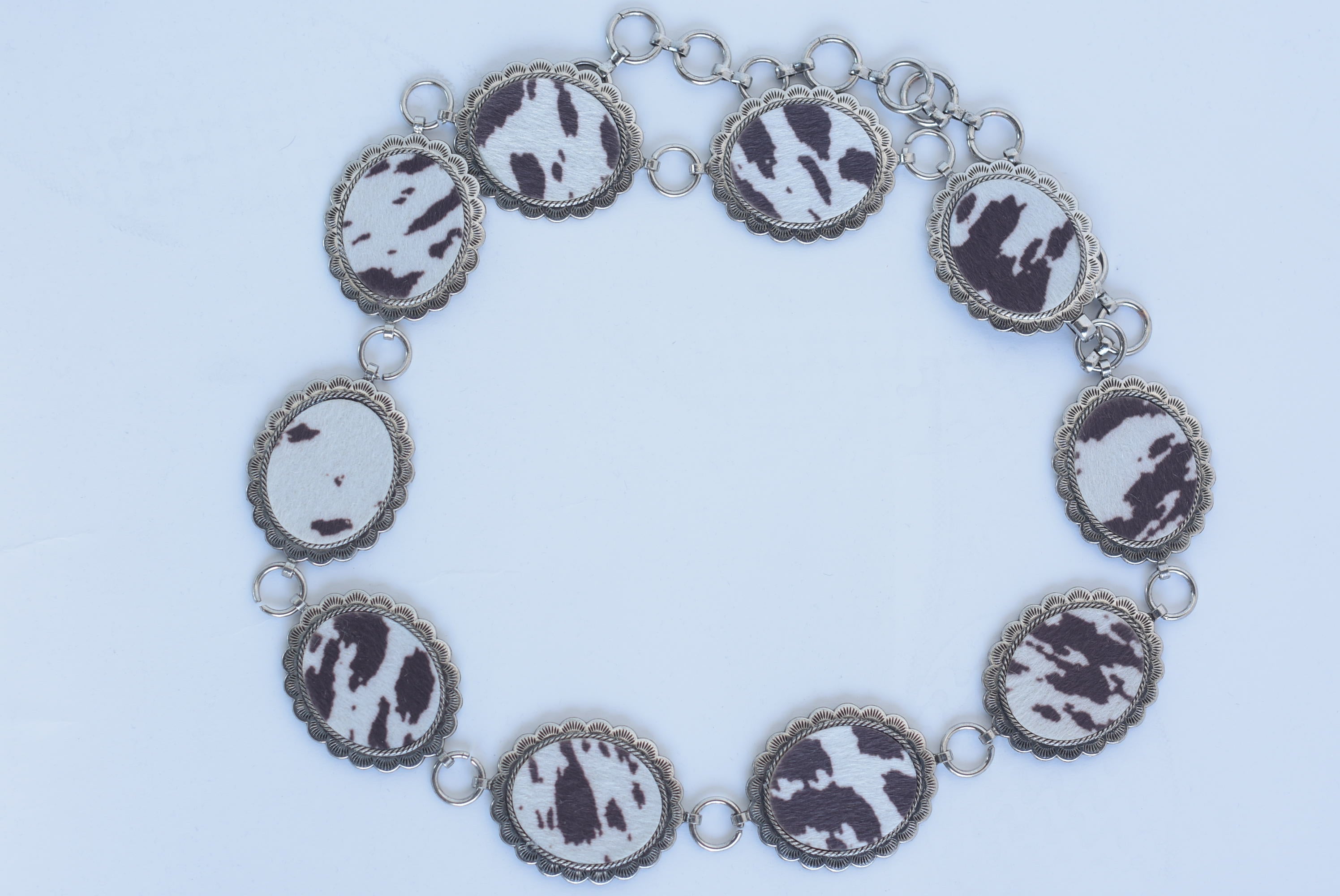 Cinturón metálico medallón cow