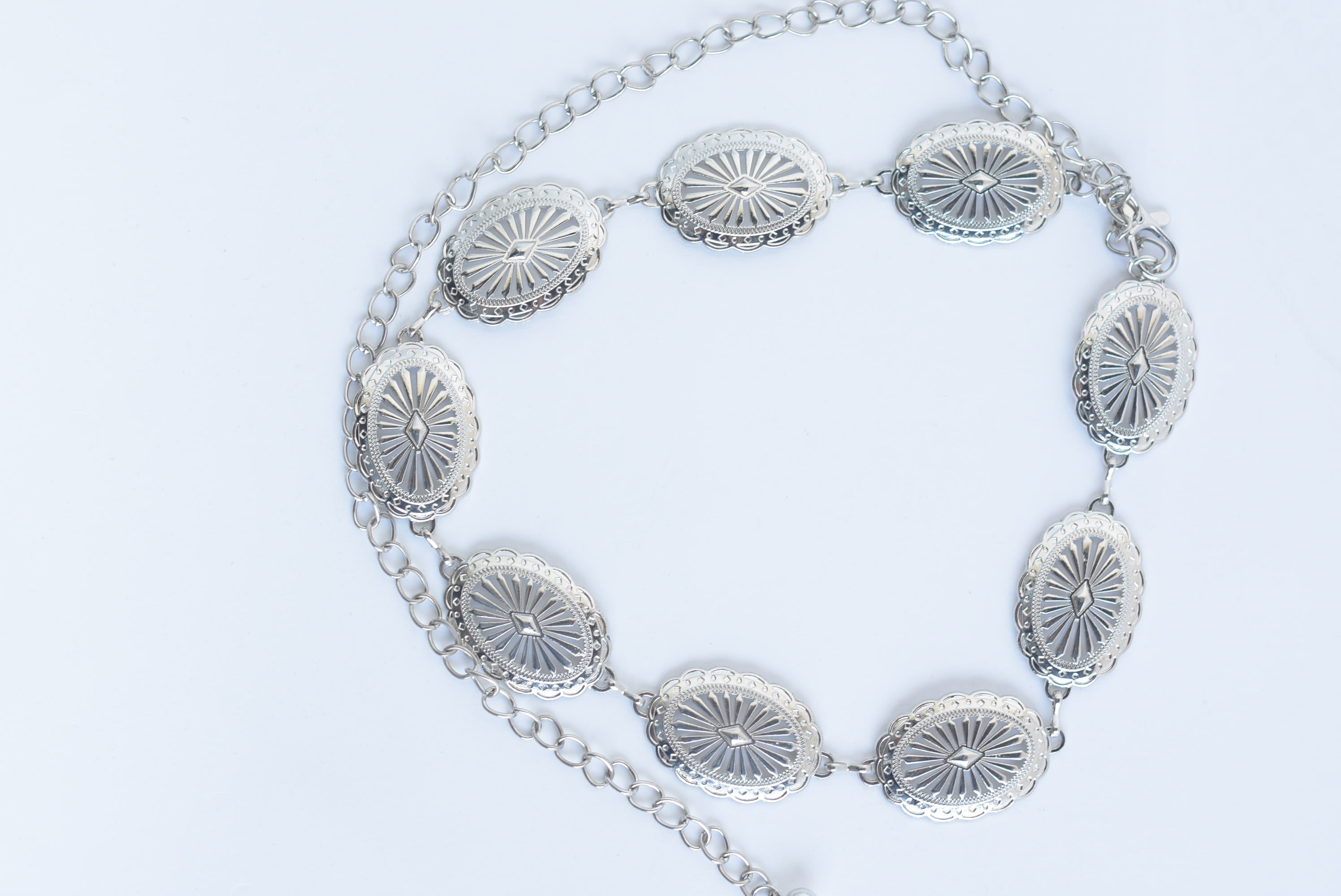 Cinturón metálico medallones