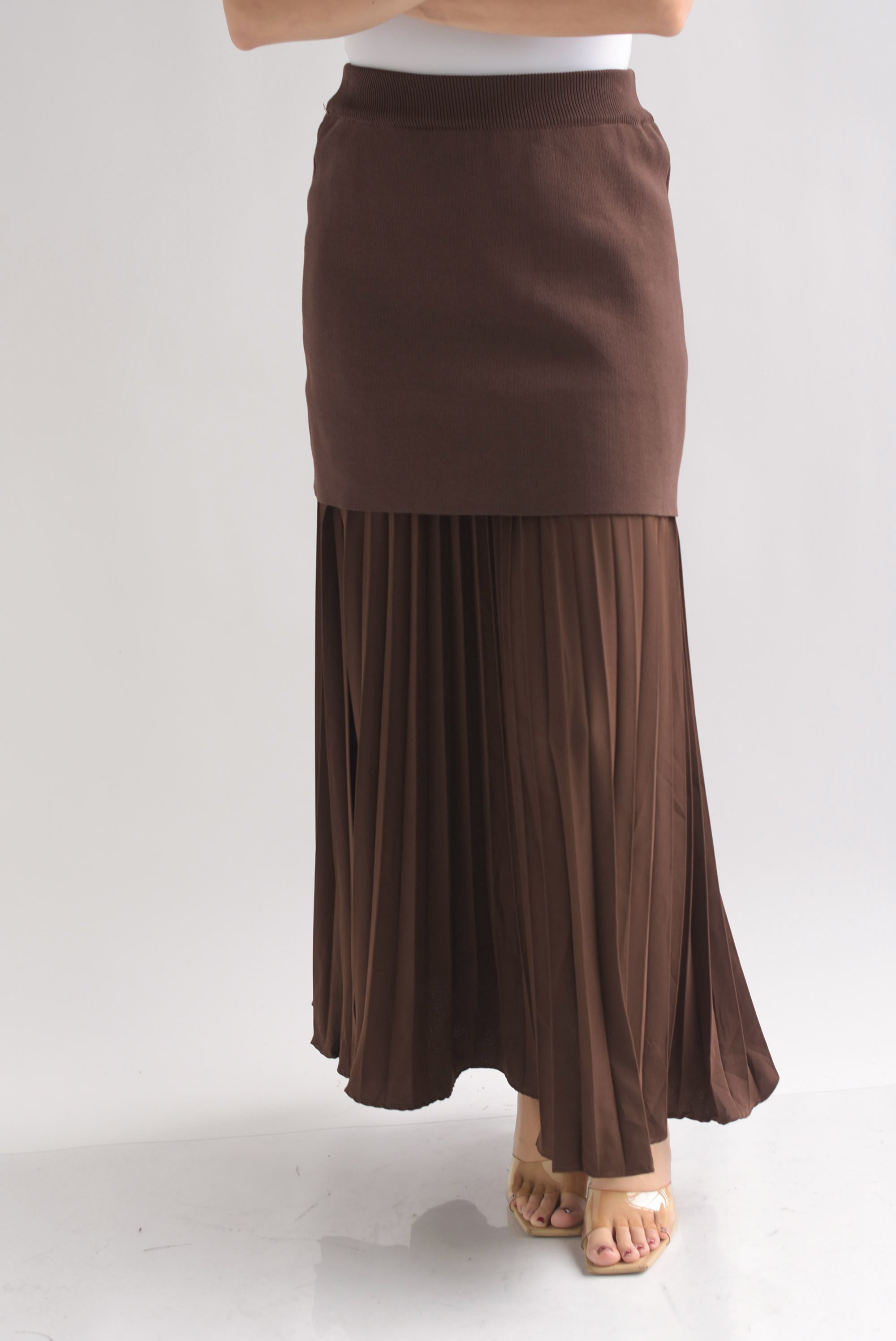 Falda plisada con falda punto en sobreposición