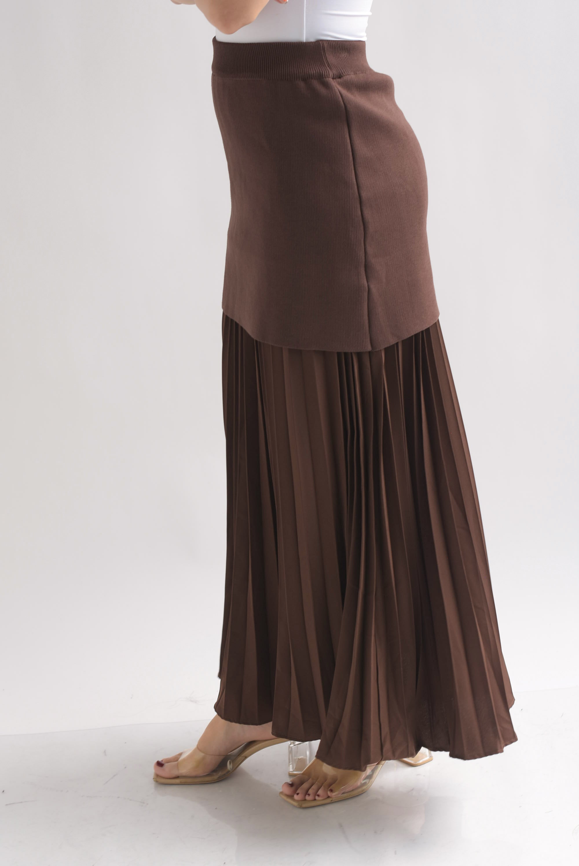 Falda plisada con falda punto en sobreposición