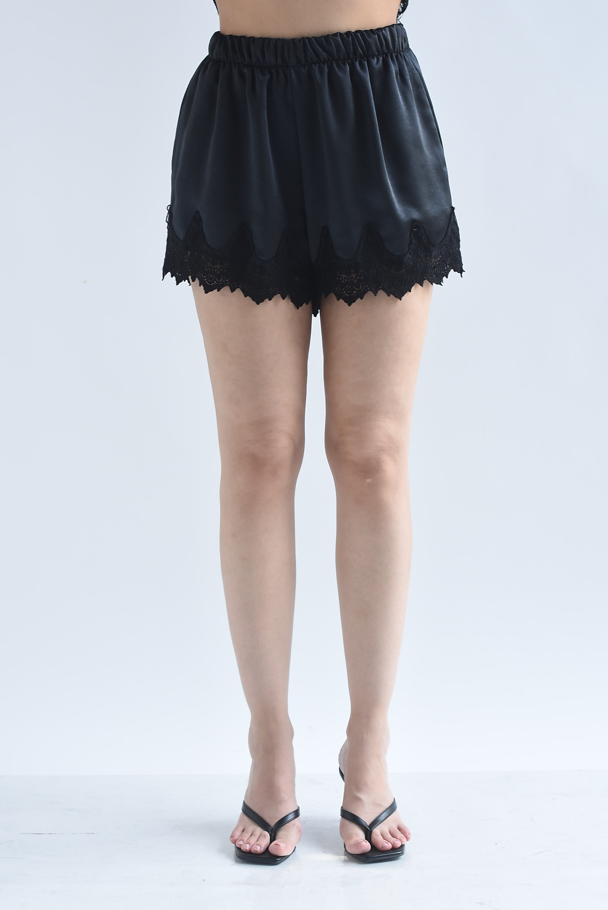 Short lencero pretina ancha encaje bolsillos