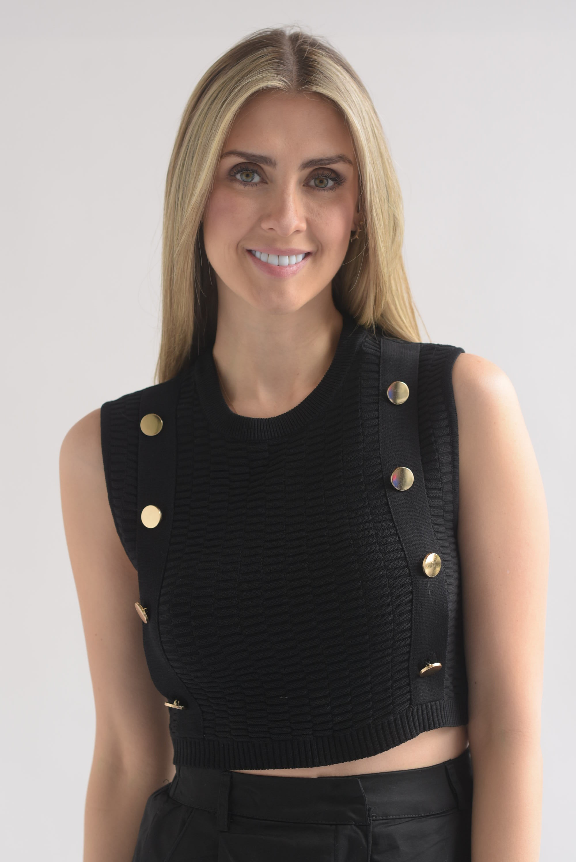 Blusa punto tira botones dorados