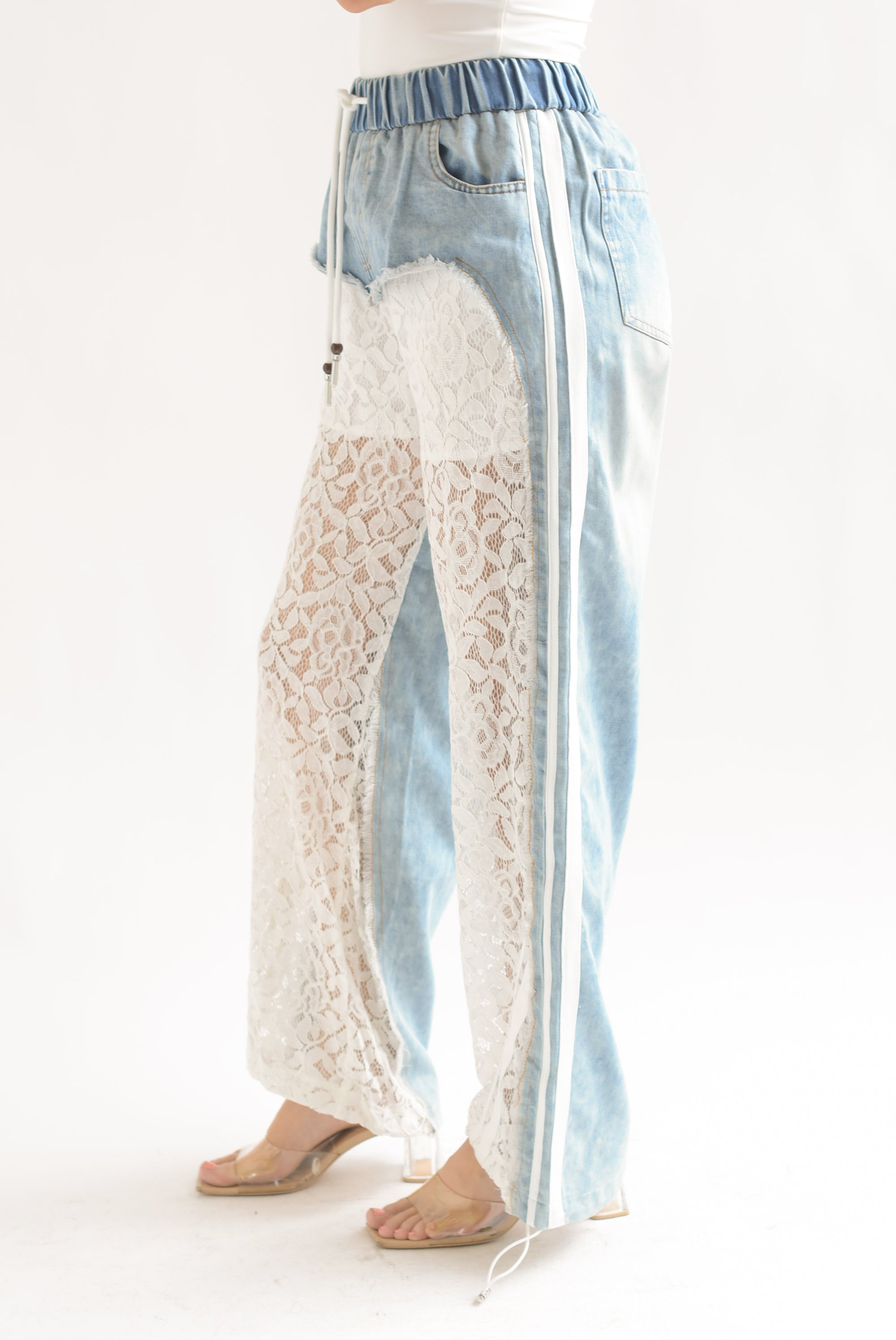 Jeans track piernas encaje Blanco