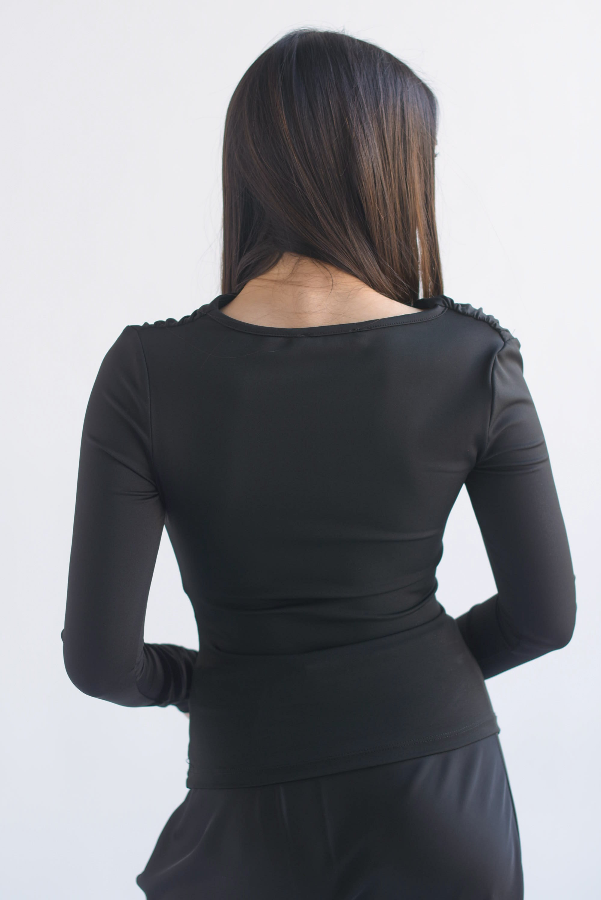 Blusa cuello asimétrico licra