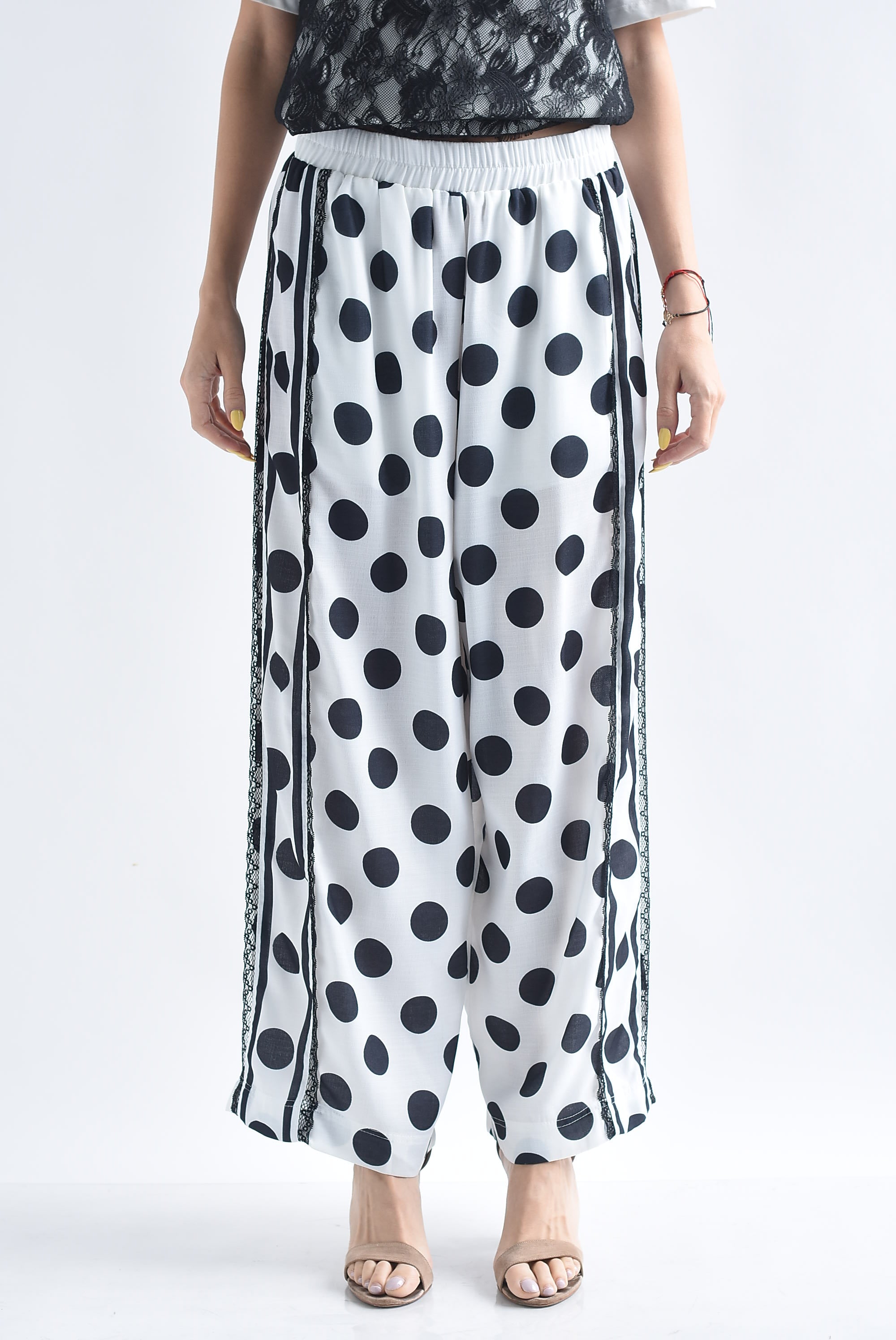Pantalón polka dots track encaje