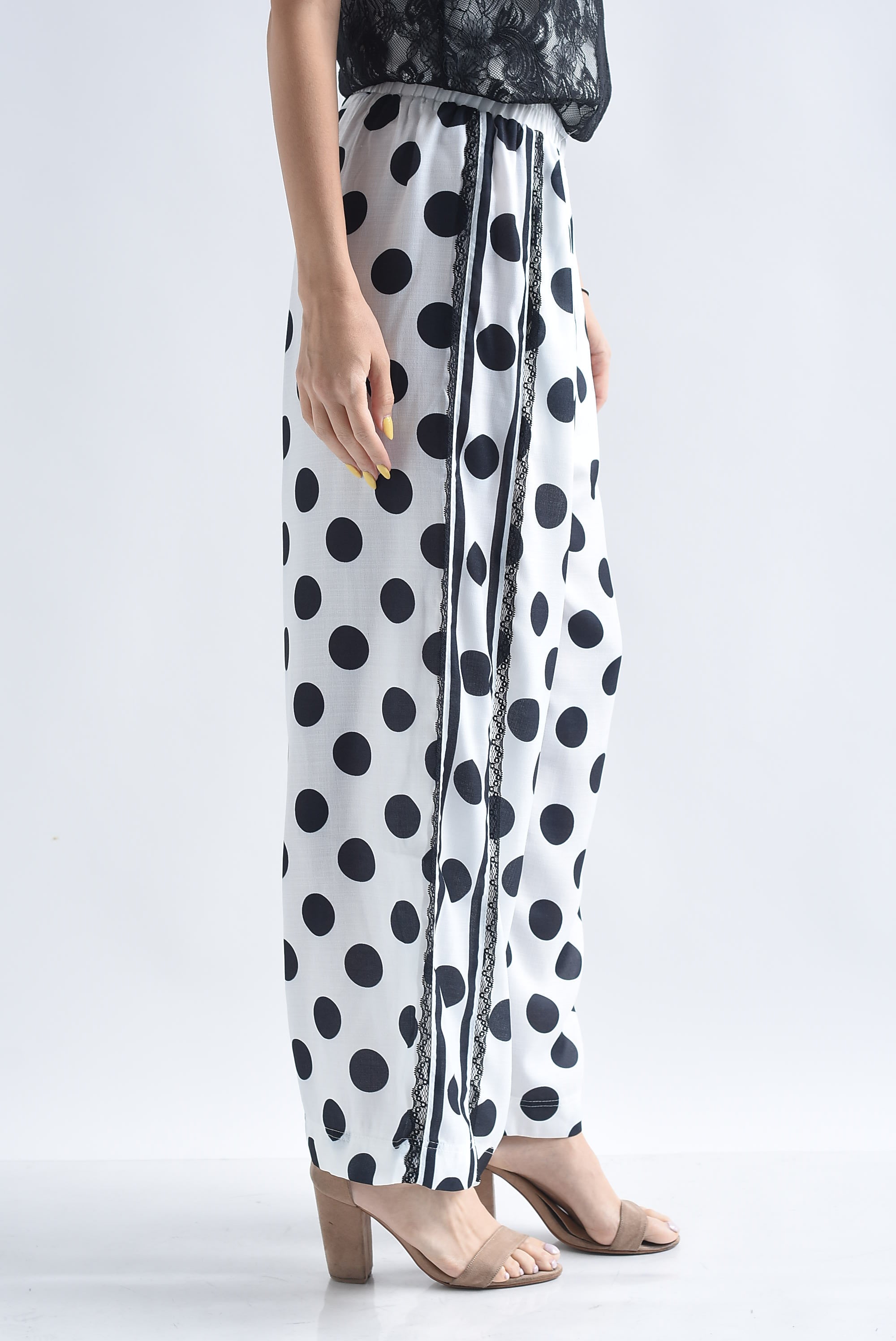 Pantalón polka dots track encaje