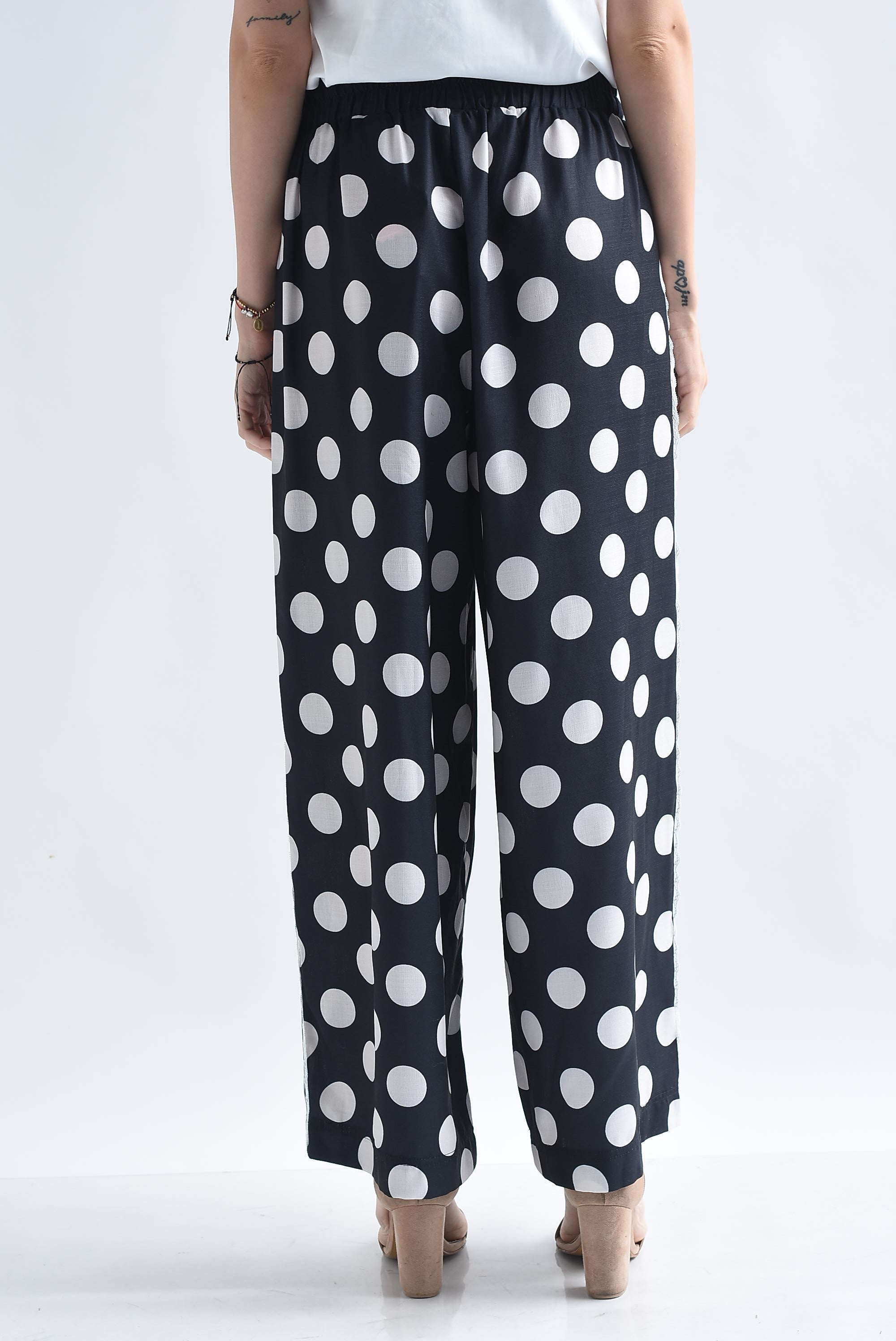Pantalón polka dots track encaje