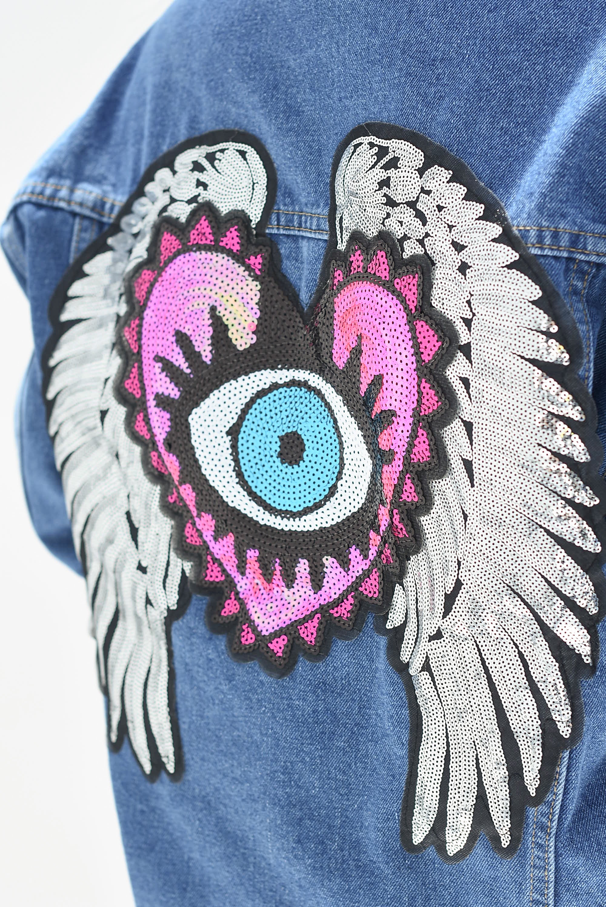 Chamarra Denim parche Alas y Ojo Turco