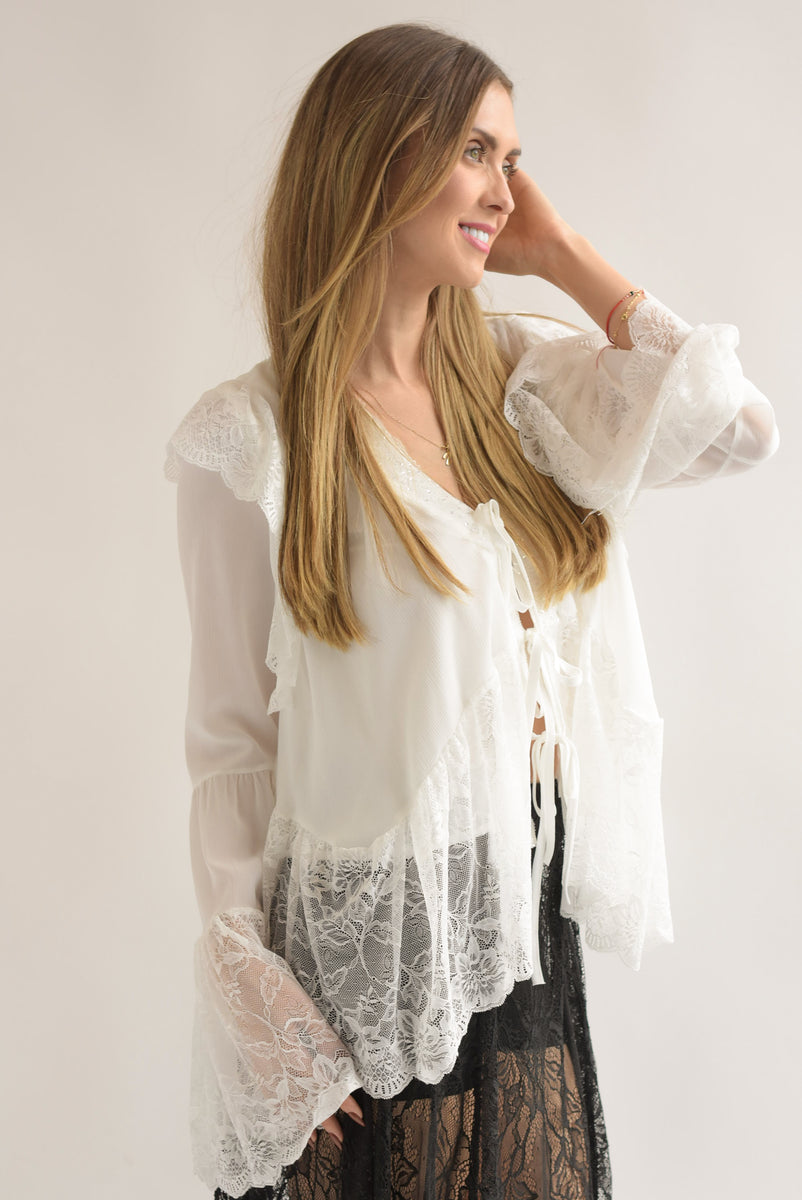 blusa blanca de olanes