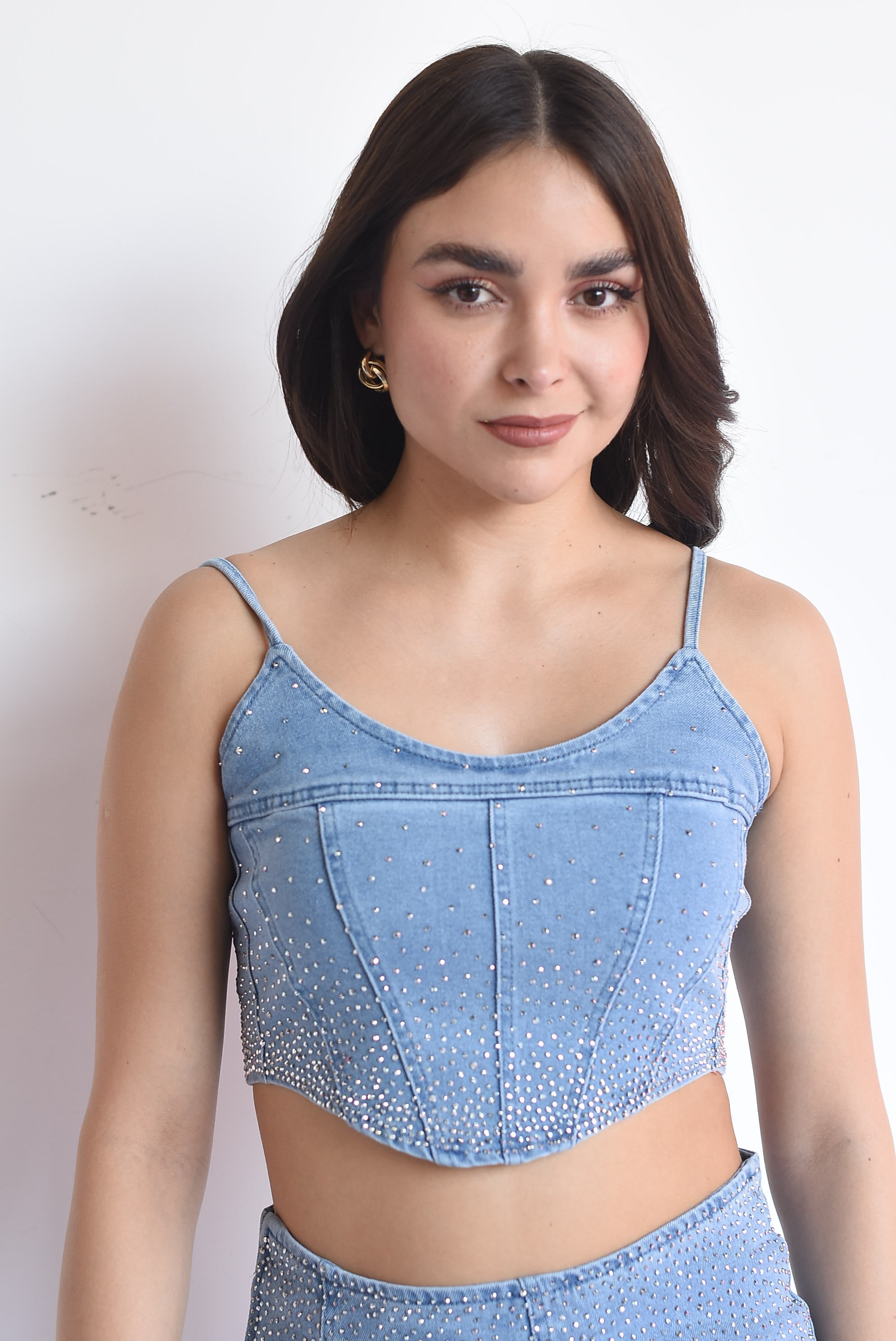 Top corsetero denim brillos