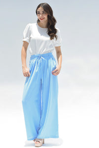 Fashion Styled Pantalón pata de elefante botones Azul baby