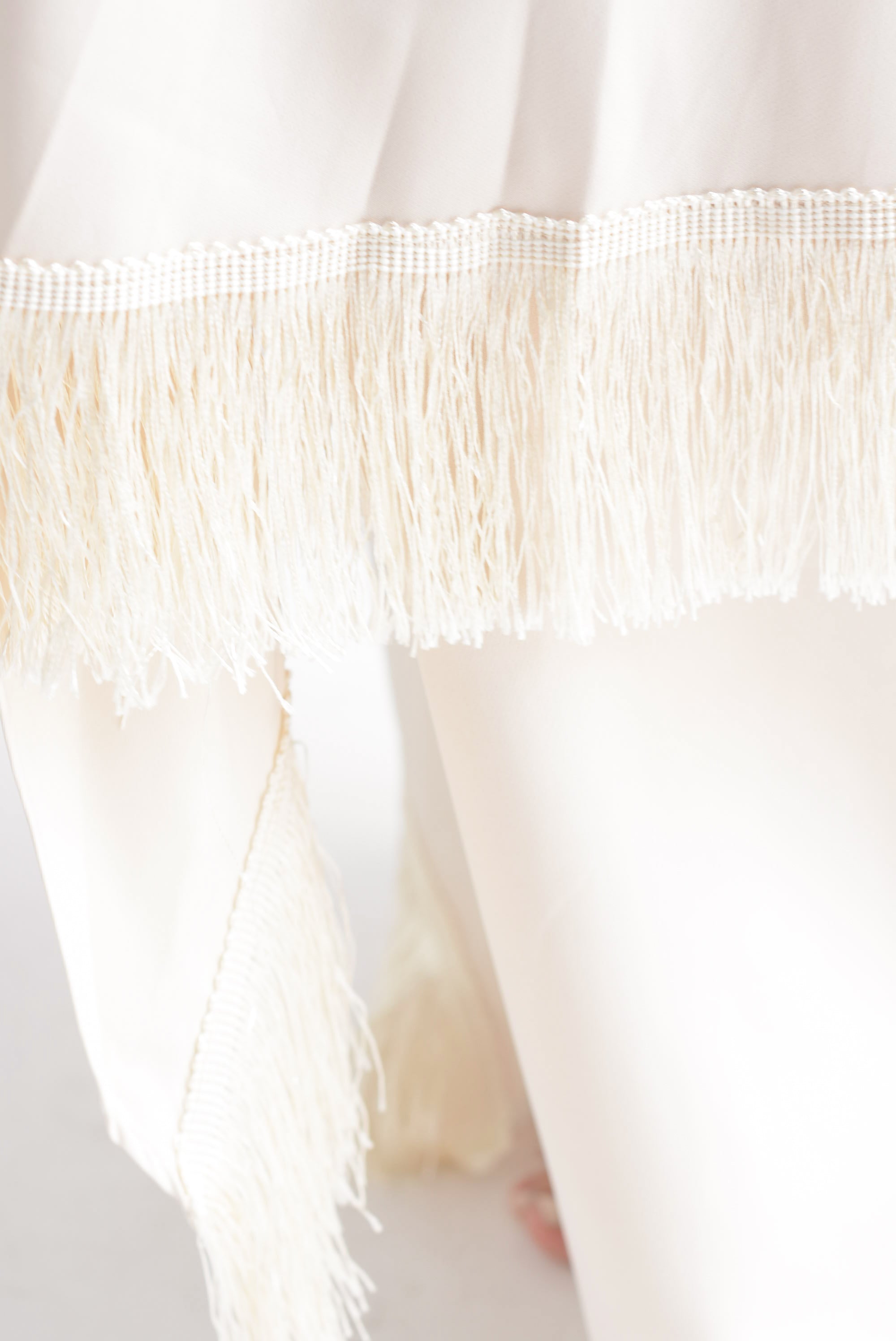 Set Pantalón cauda flecos y Top corrugado Ivory