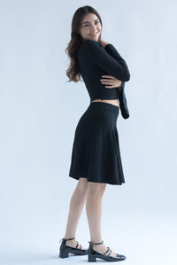Fashion Styled Set Falda plisada y Blusa manga trompeta punto Negro