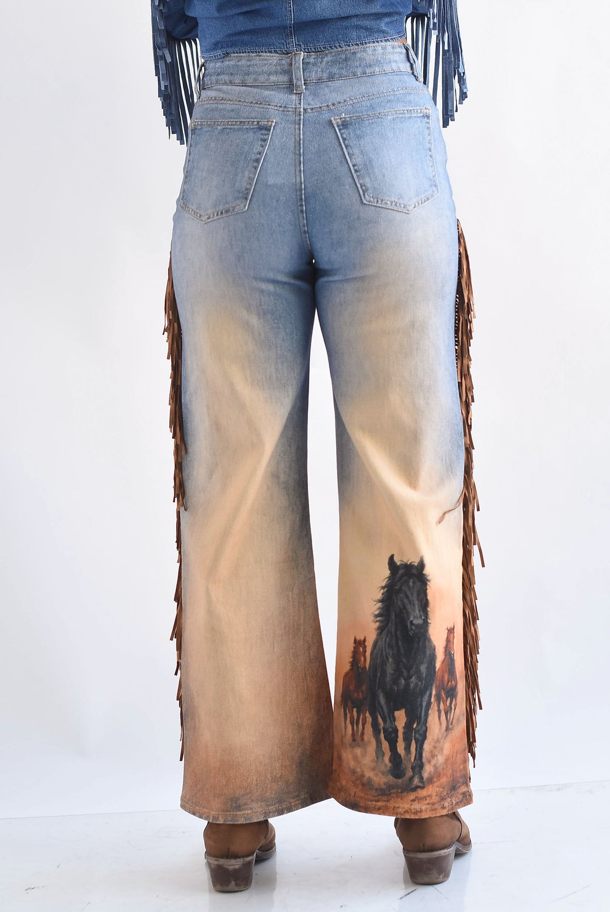 Jeans caballos flecos suede