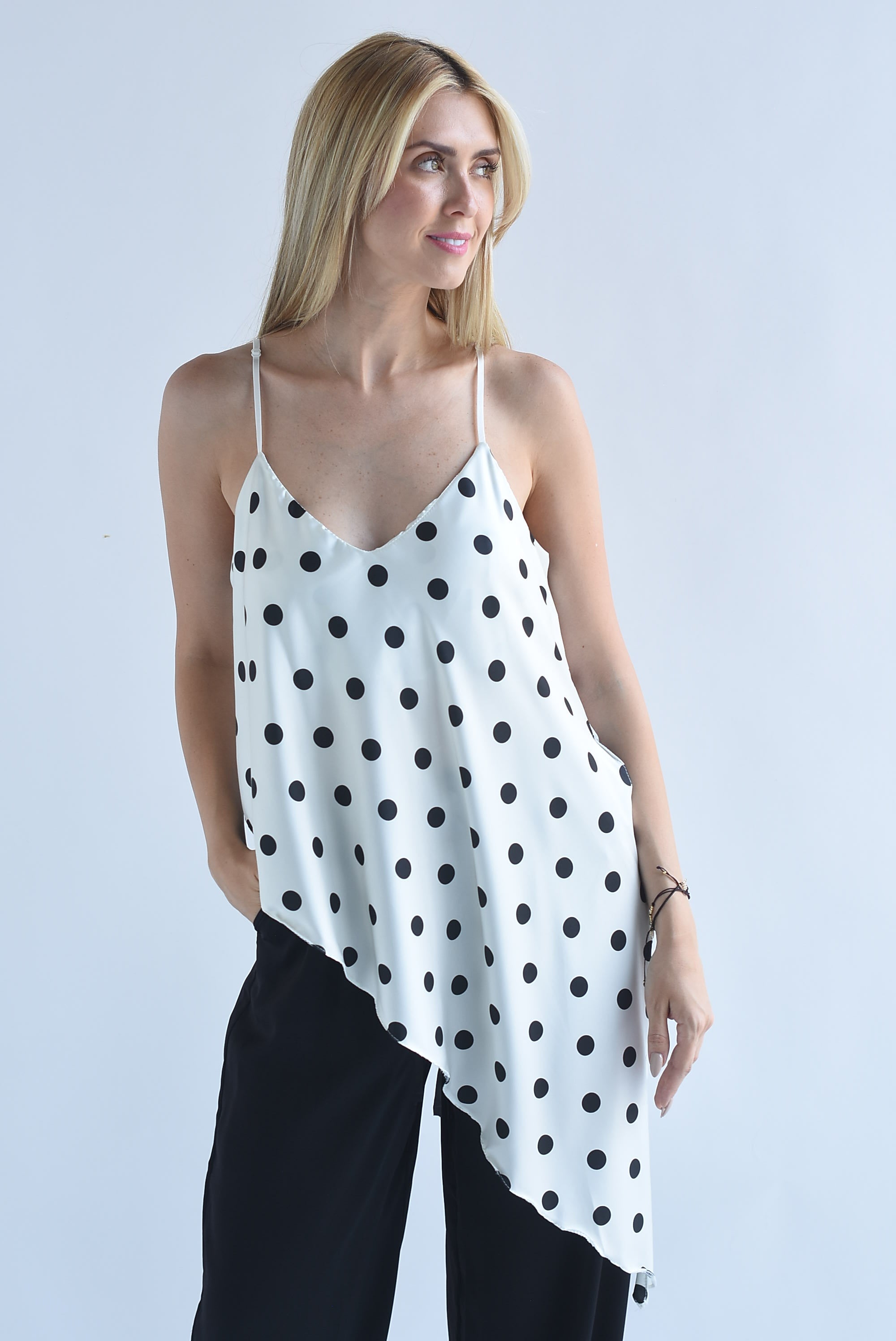 Top lencero asimétrico abertura polka dots
