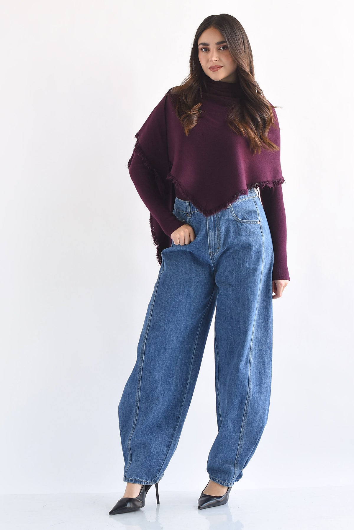Sweater con capa