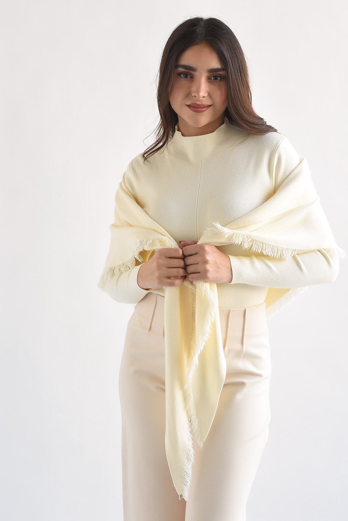 Sweater con capa