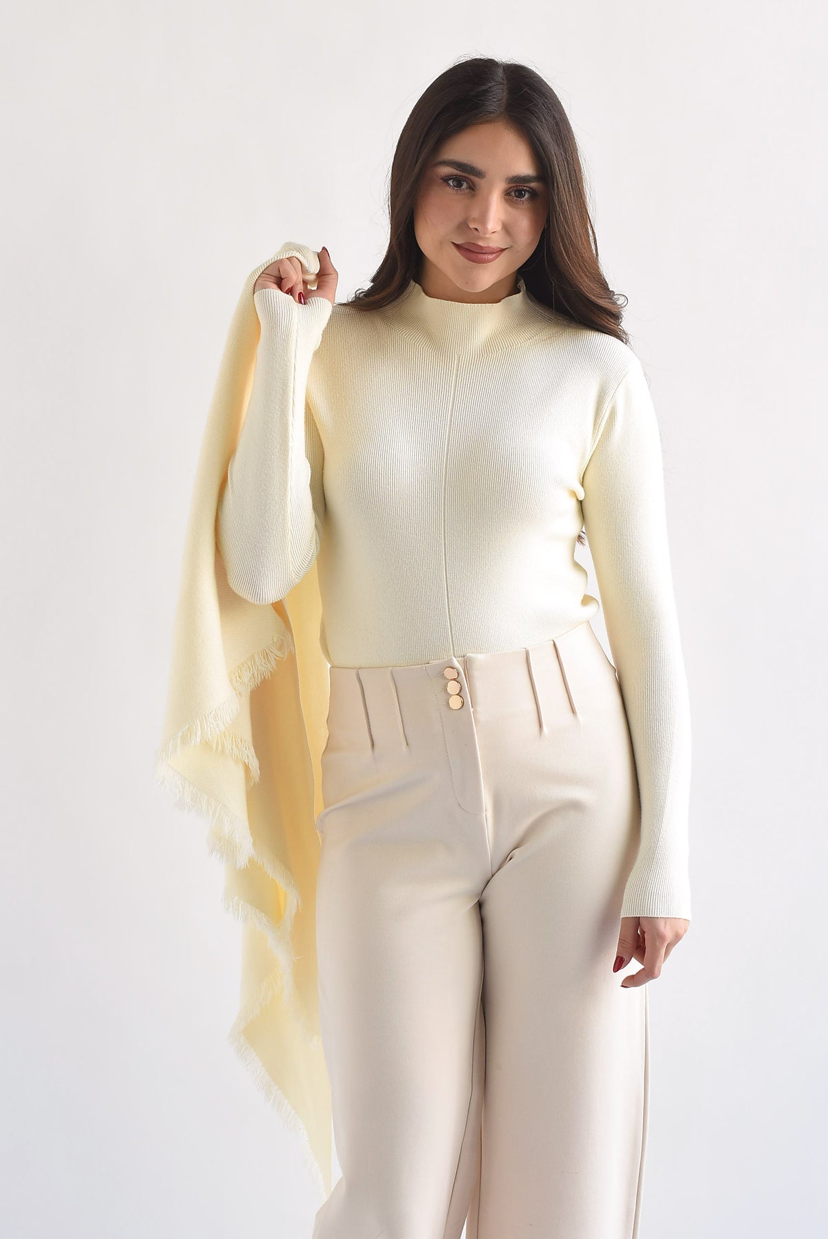 Sweater con capa