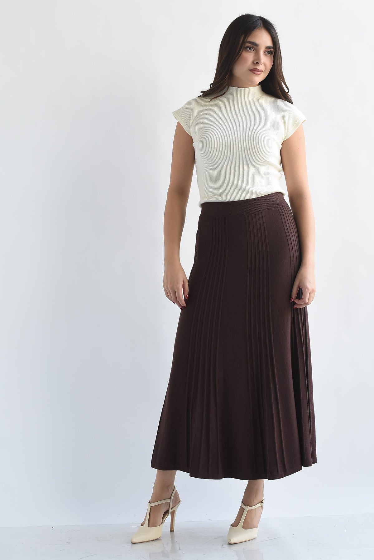 Falda midi punto plisada
