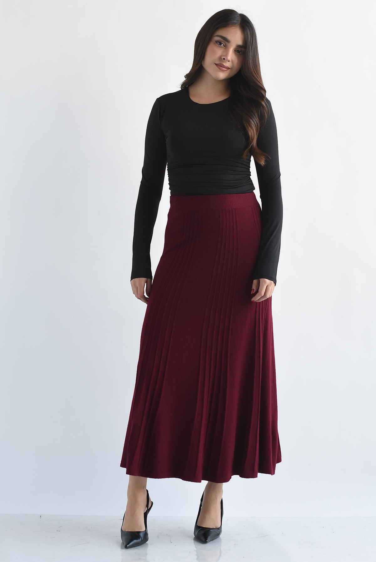 Falda midi punto plisada