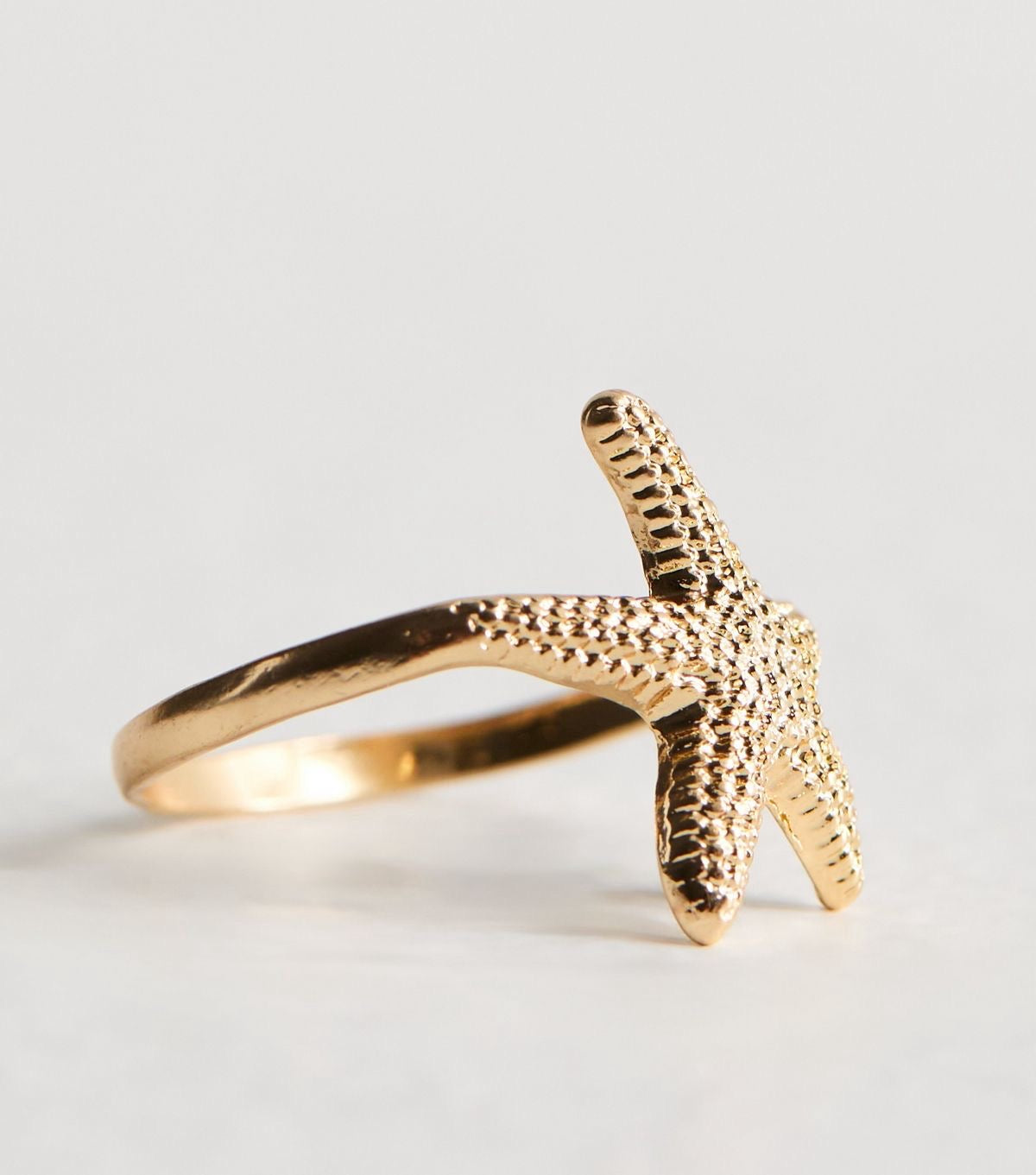 Anillo estrella Dorado