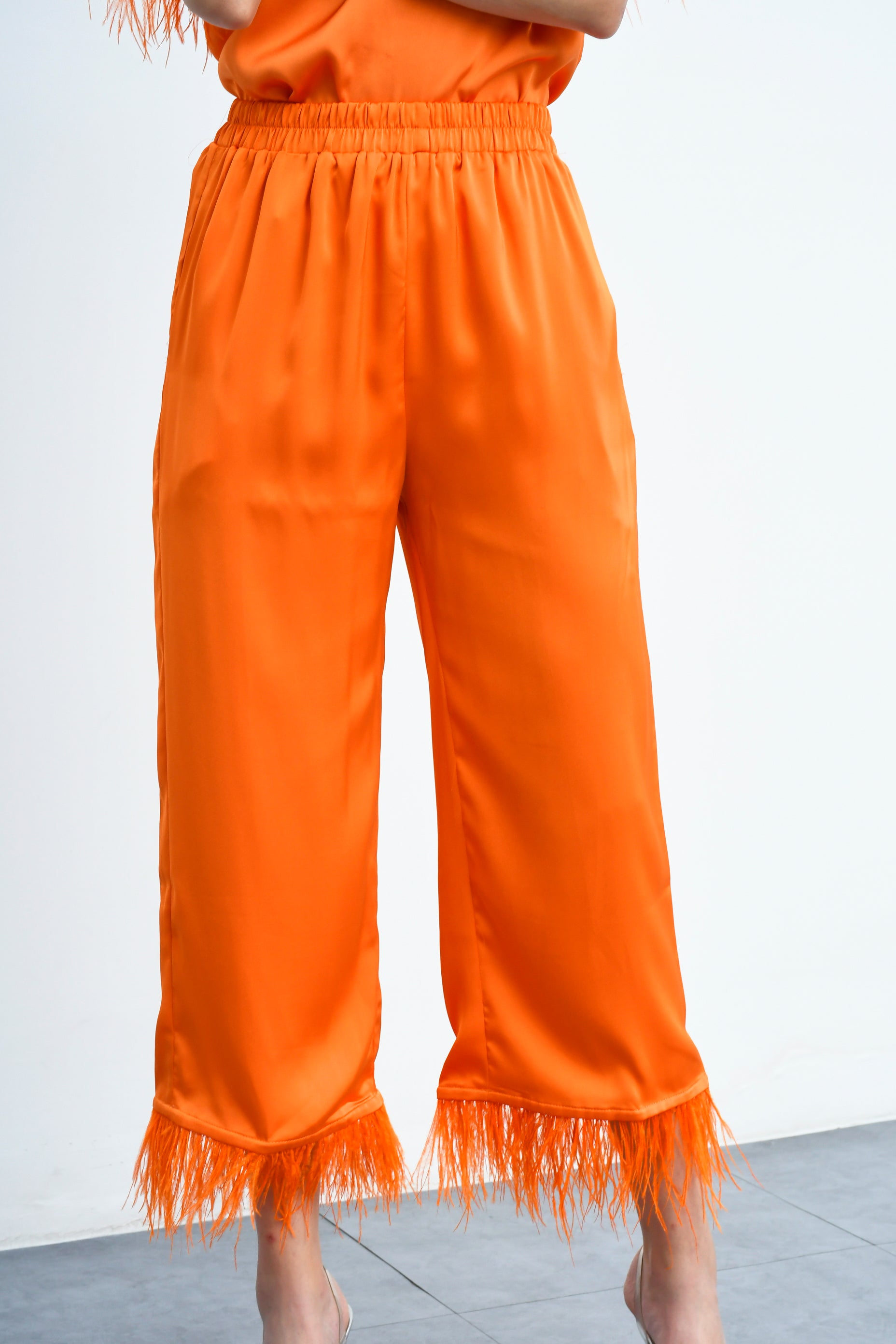 Pantalón satín plumas Naranja