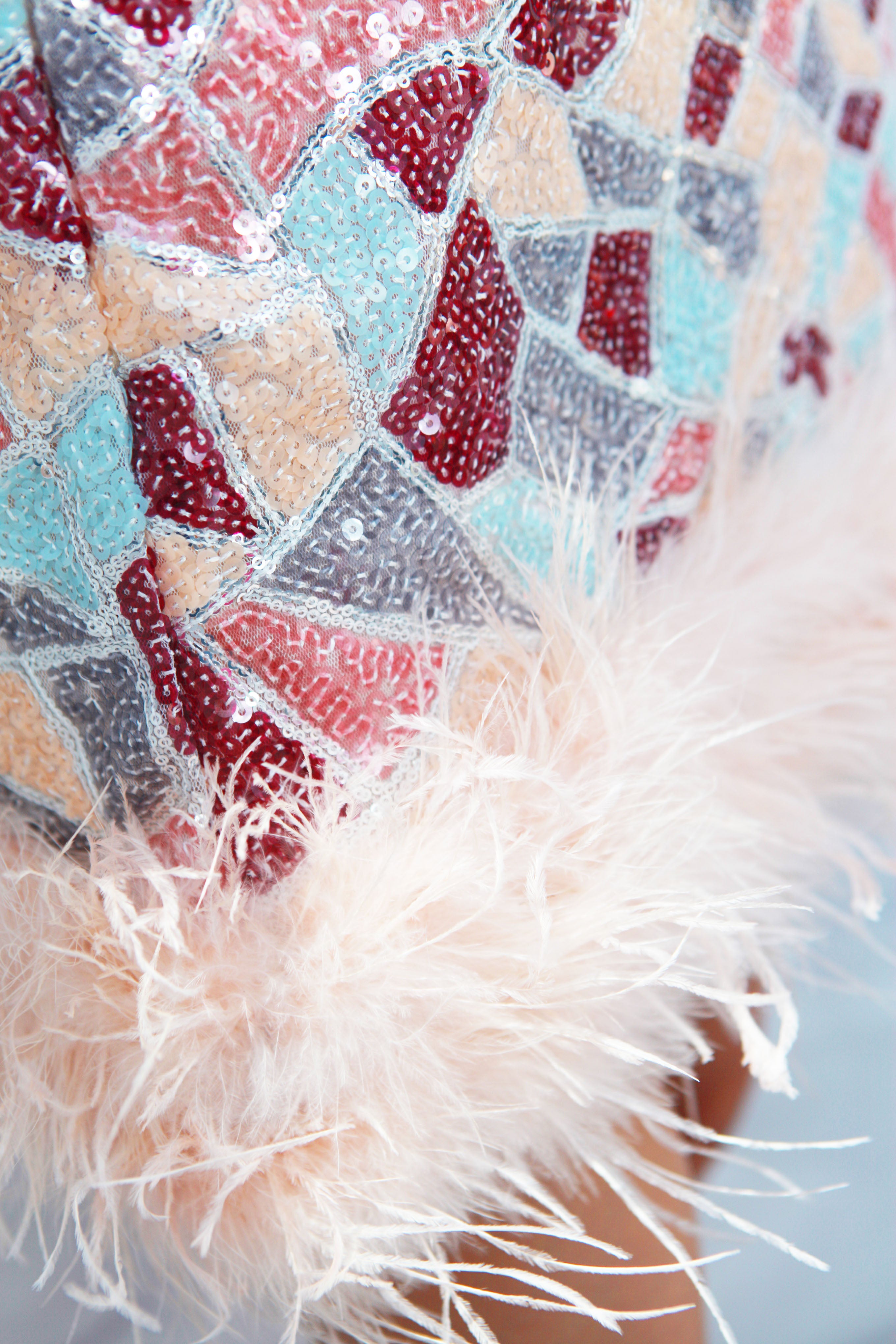 Mini falda lentejuelas vitral con plumas Rosa