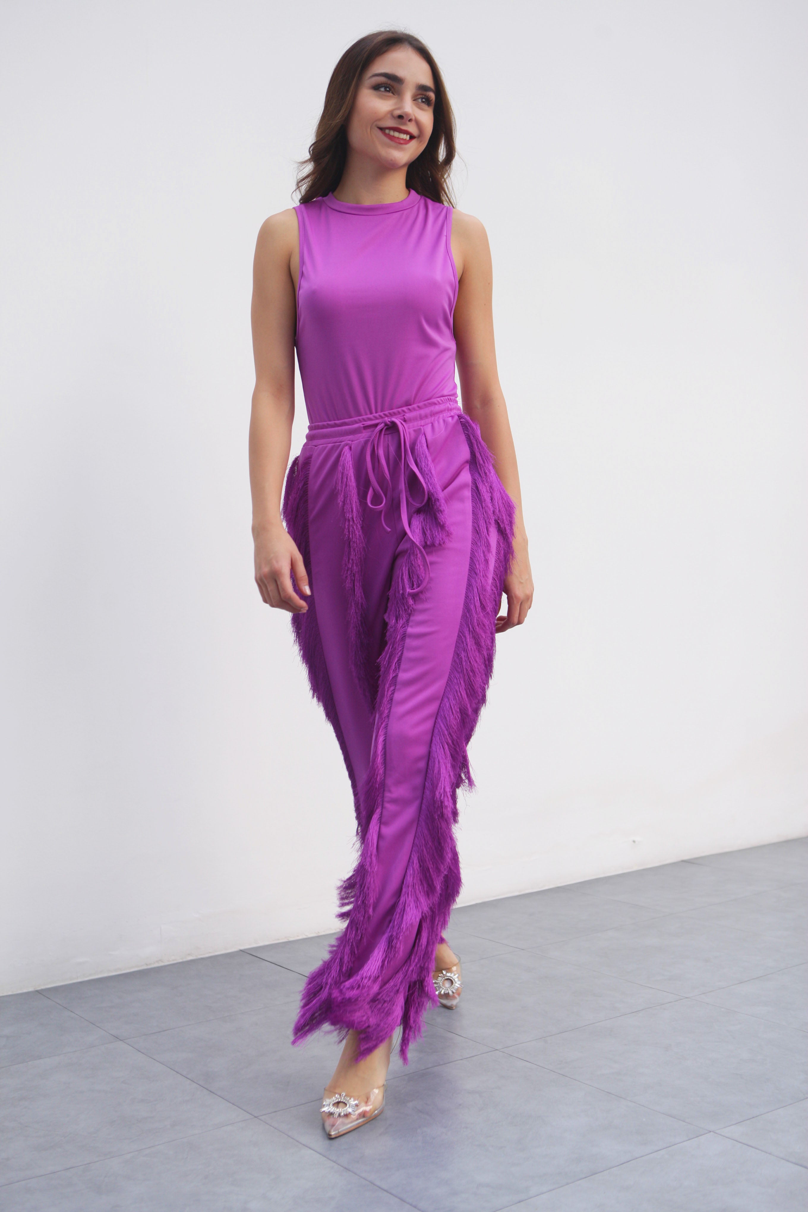 Set Pantalón flecos y Body Morado