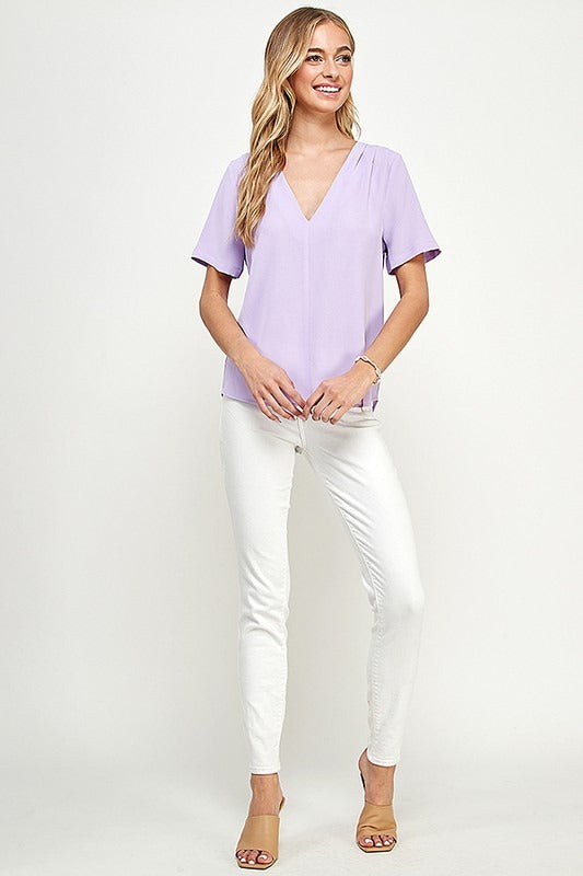 Blusa cuello V drapeado hombros Lila