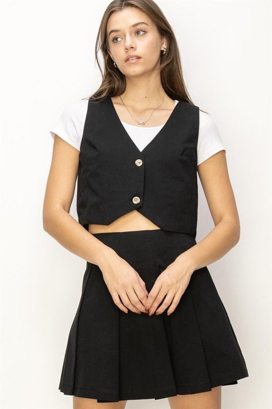 Set Falda corta y Chaleco Negro