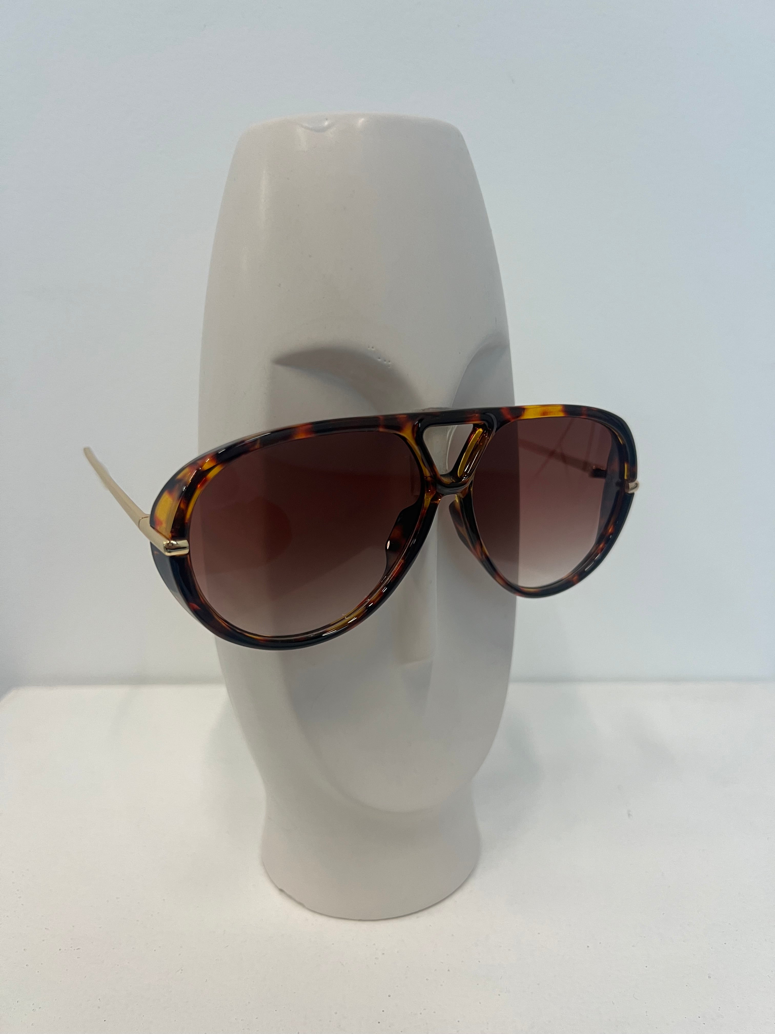 Lentes ovalado con dorado