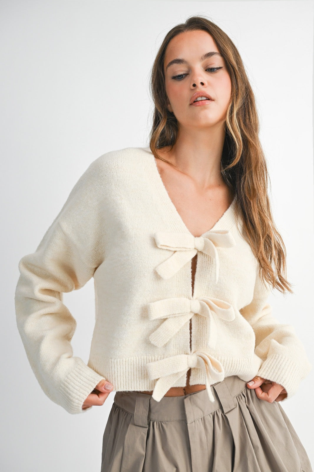 Sweater punto moños reversible Ivory