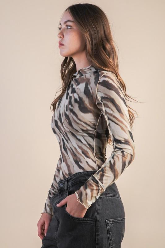 Blusa mesh costuras animal print