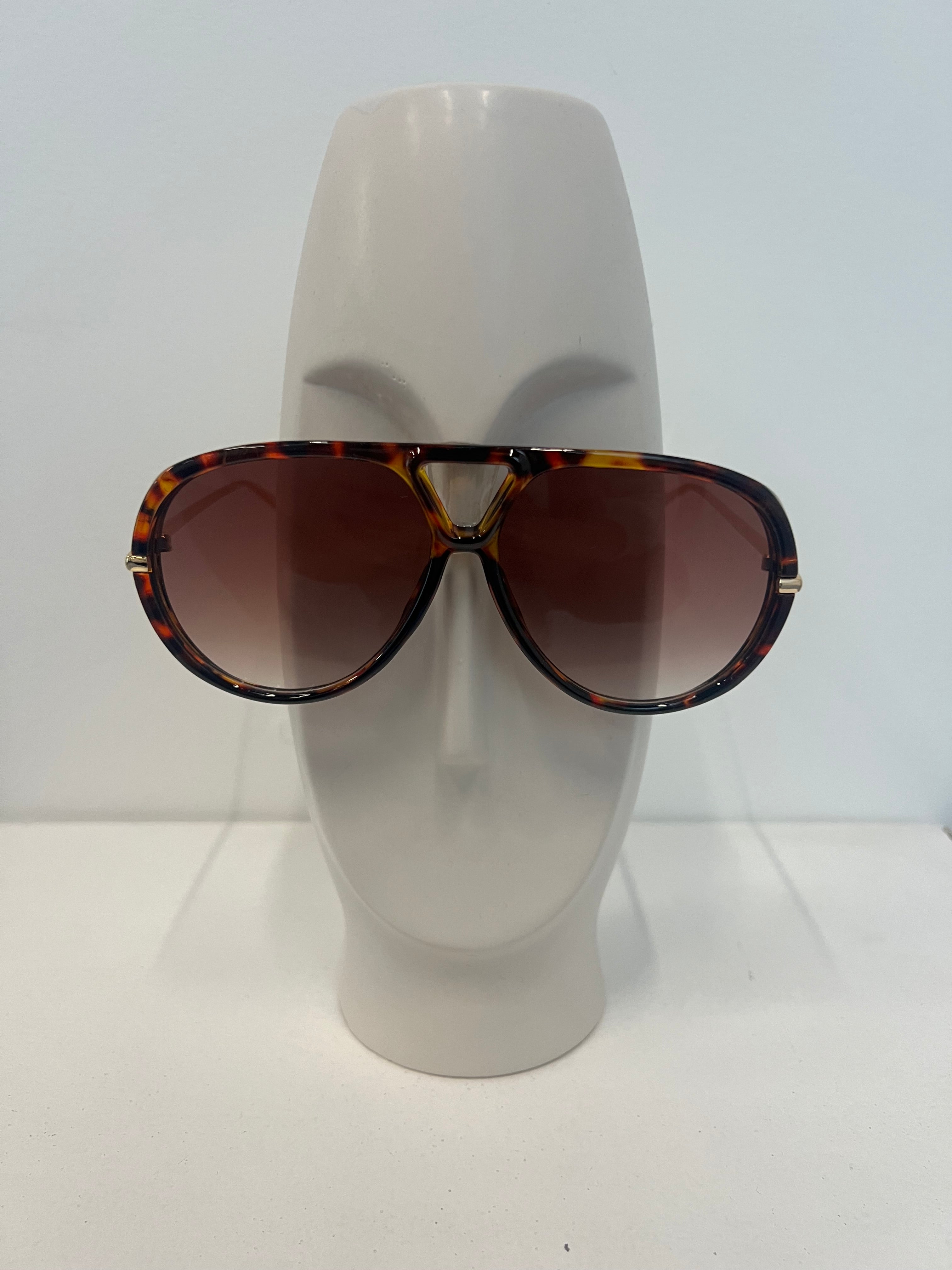 Lentes ovalado con dorado