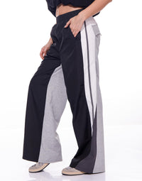 Fashion Styled Pantalón nylon negro con pants gris y líneas track