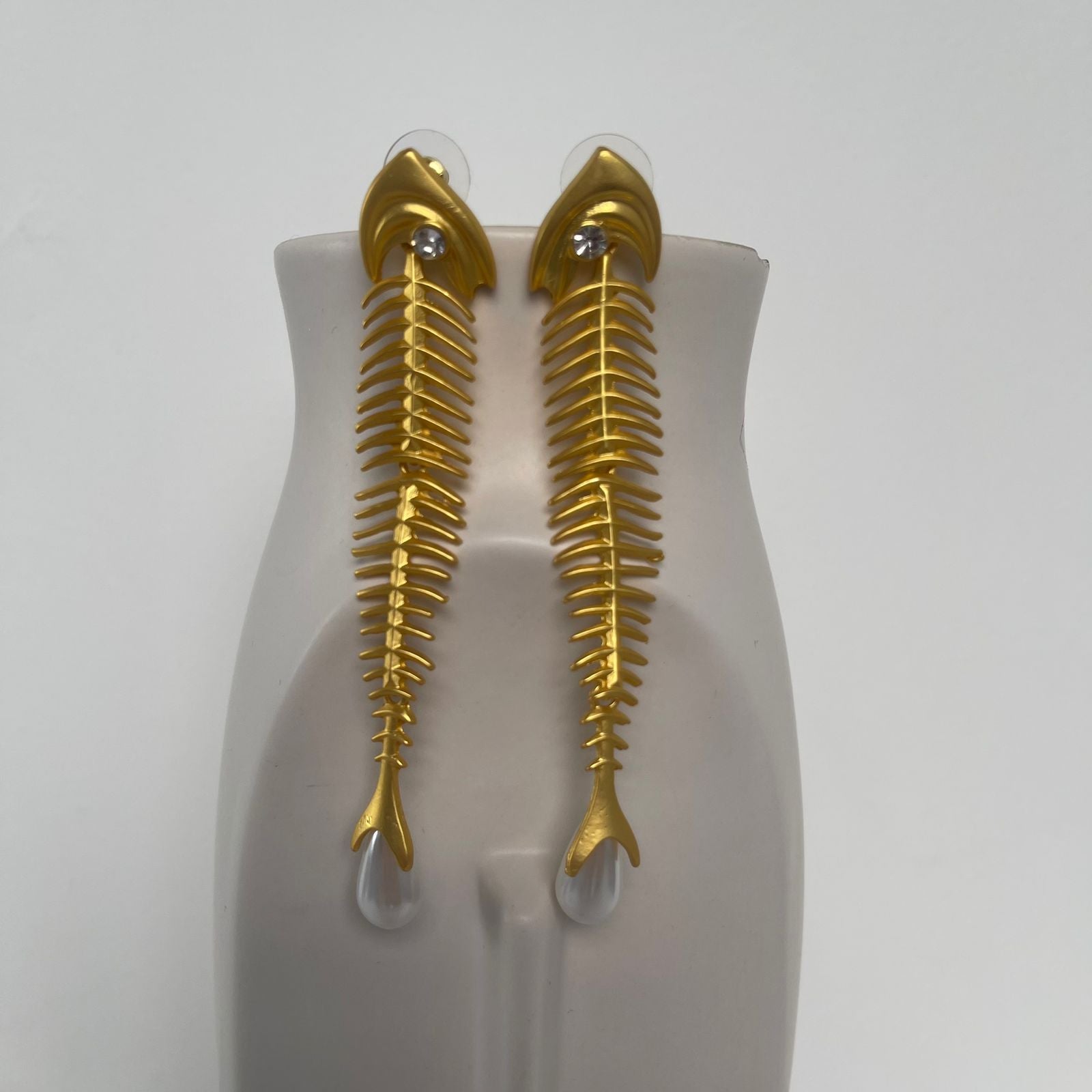 Aretes espinas pescado