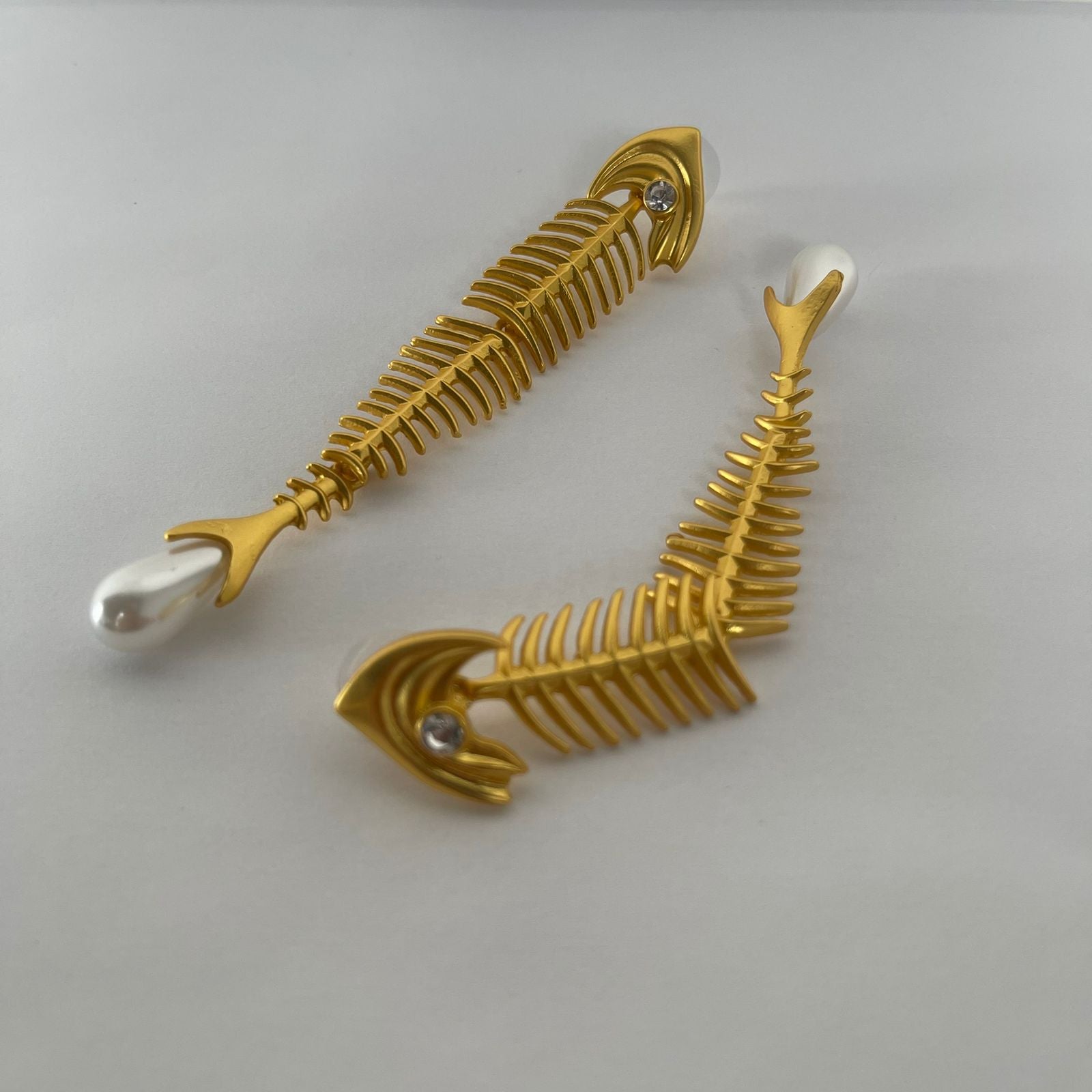 Aretes espinas pescado