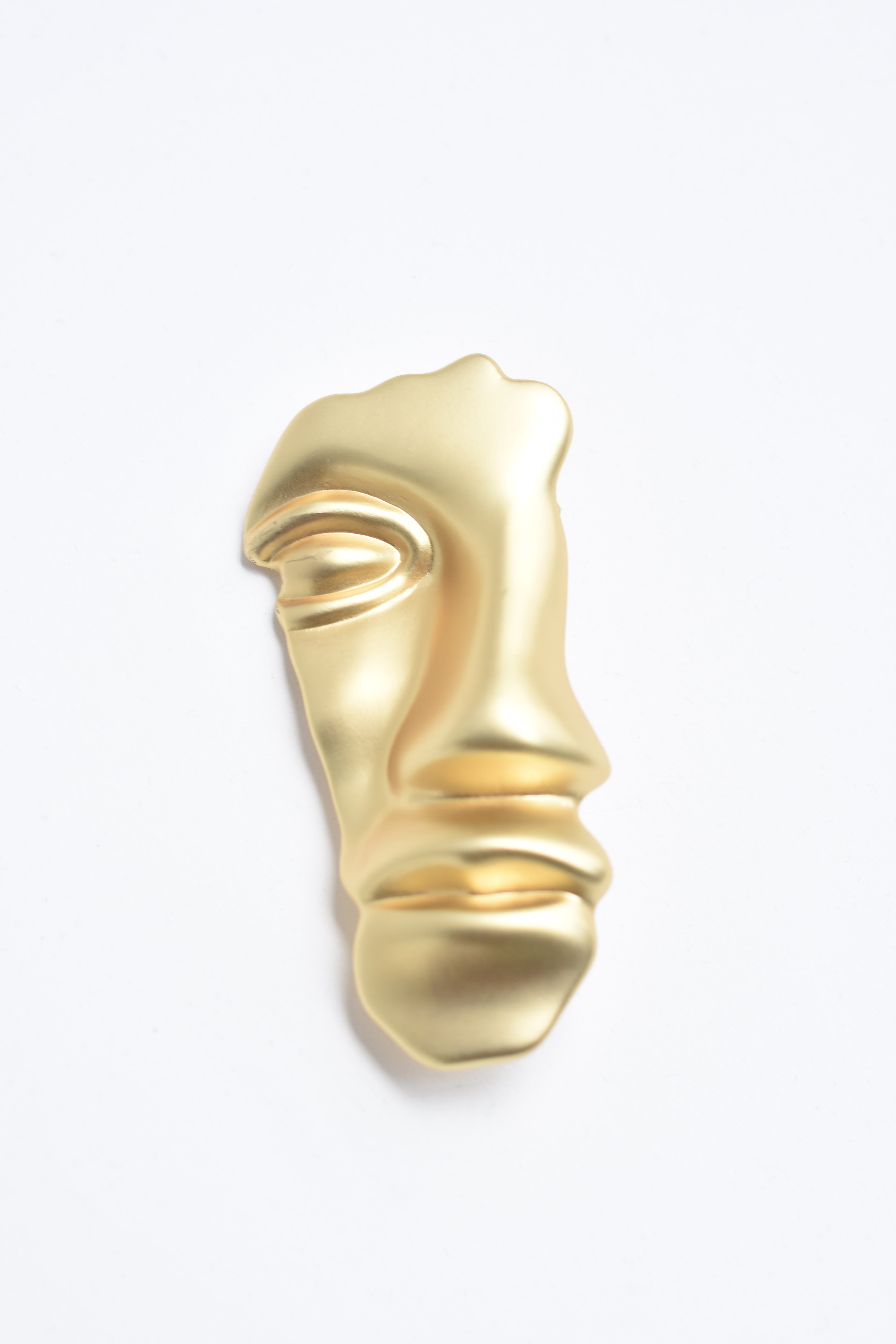 Broche rostro