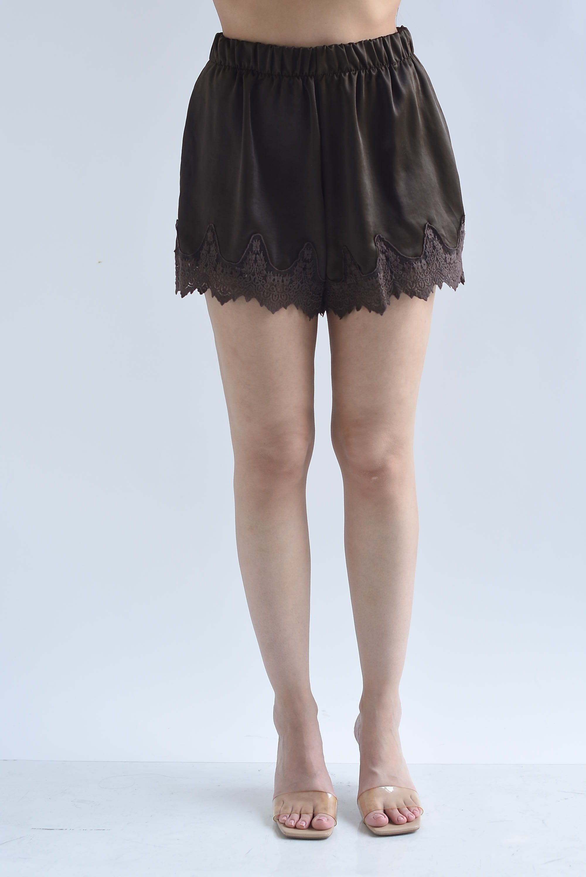 Short lencero pretina ancha encaje bolsillos