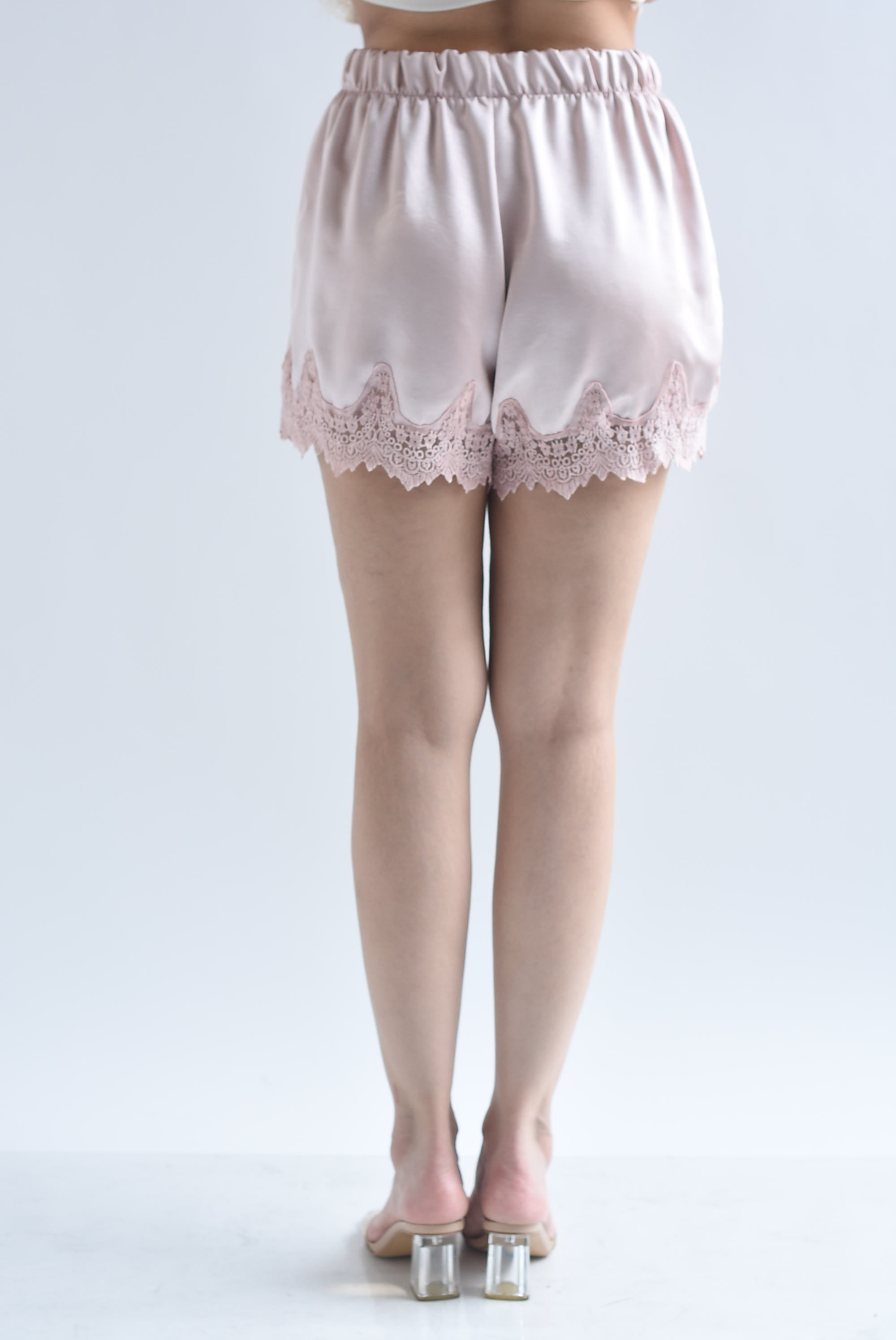 Short lencero pretina ancha encaje bolsillos