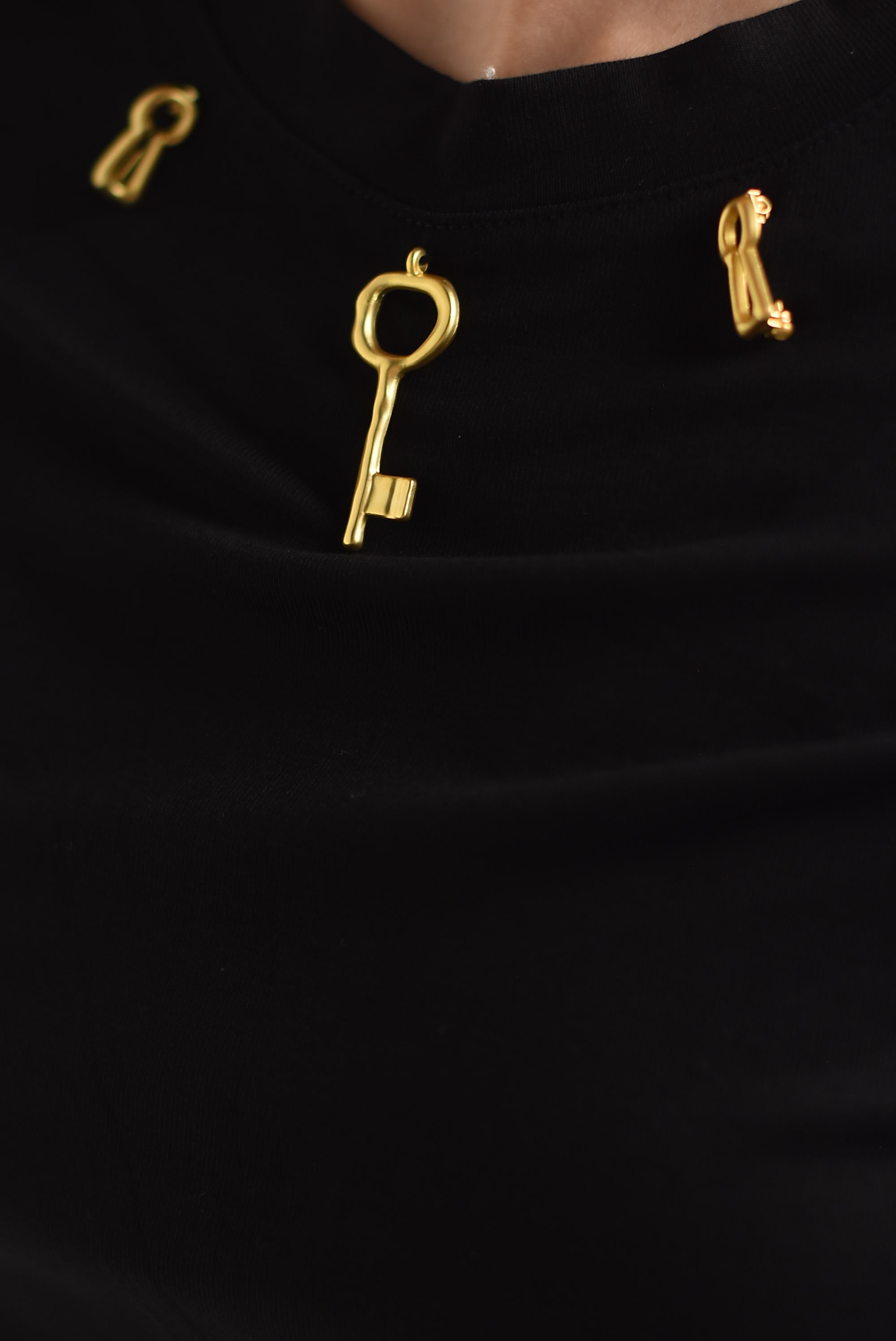 T-Shirt drapeado broche cerradura