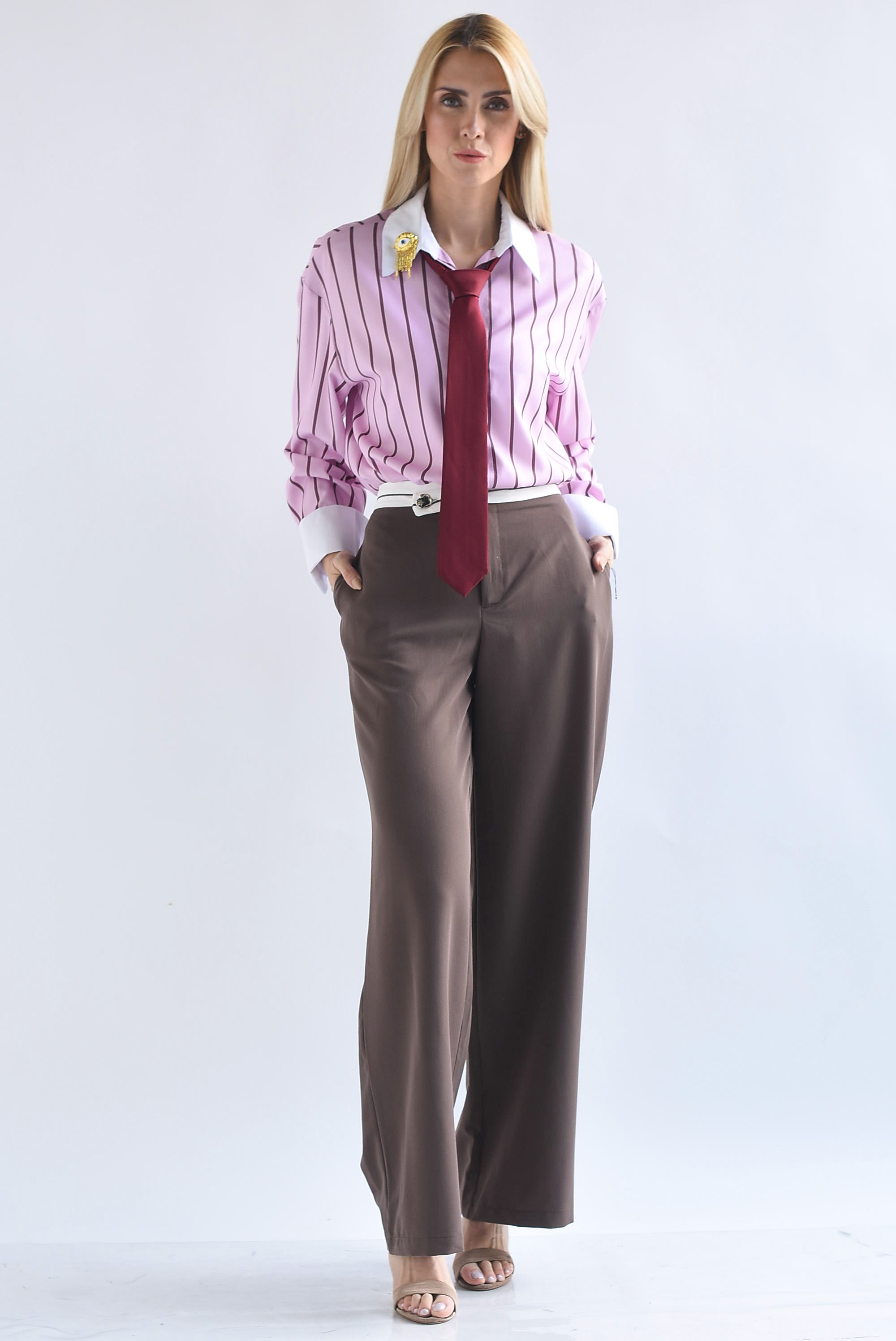 Camisa rayas broche ojo