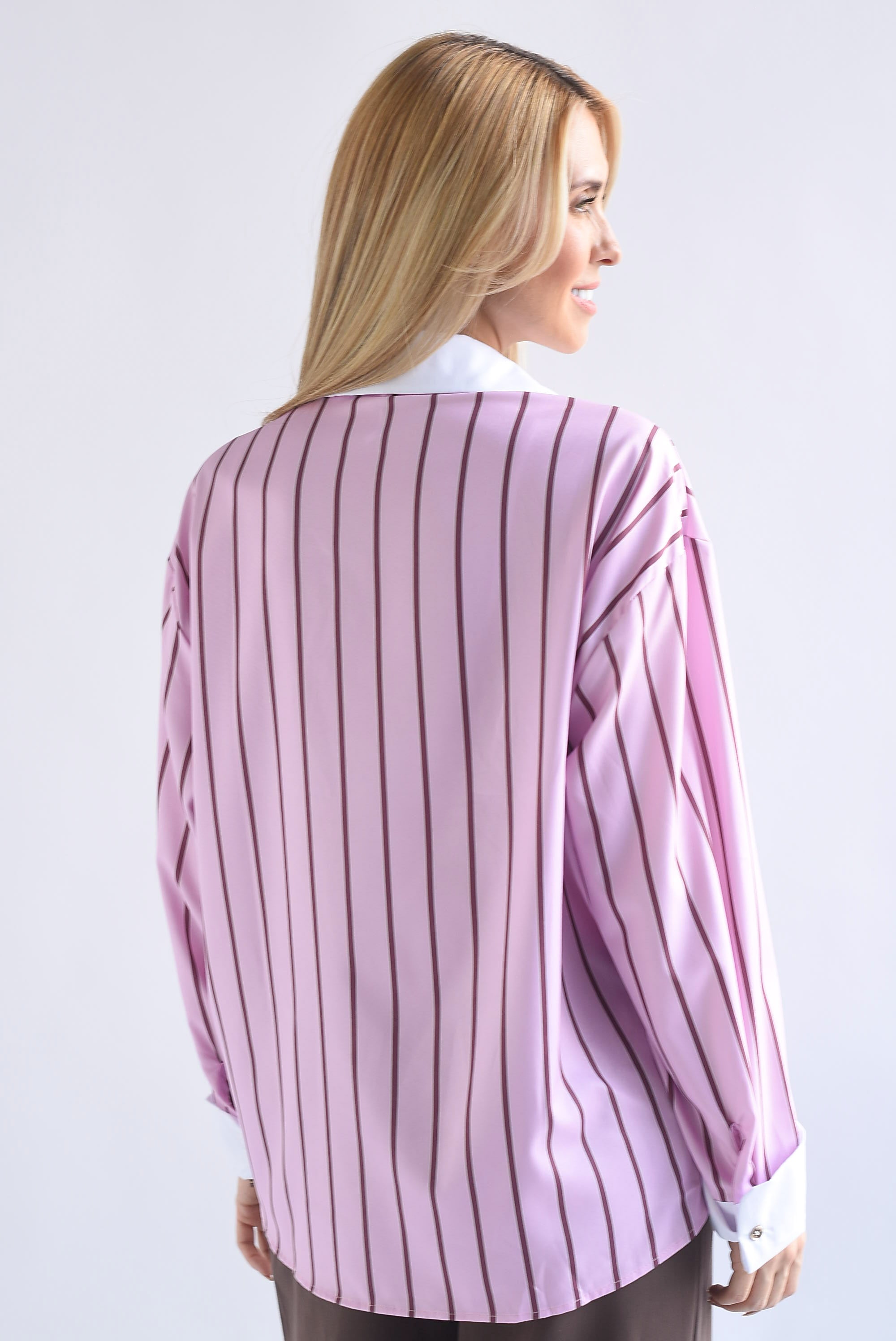 Camisa rayas broche ojo