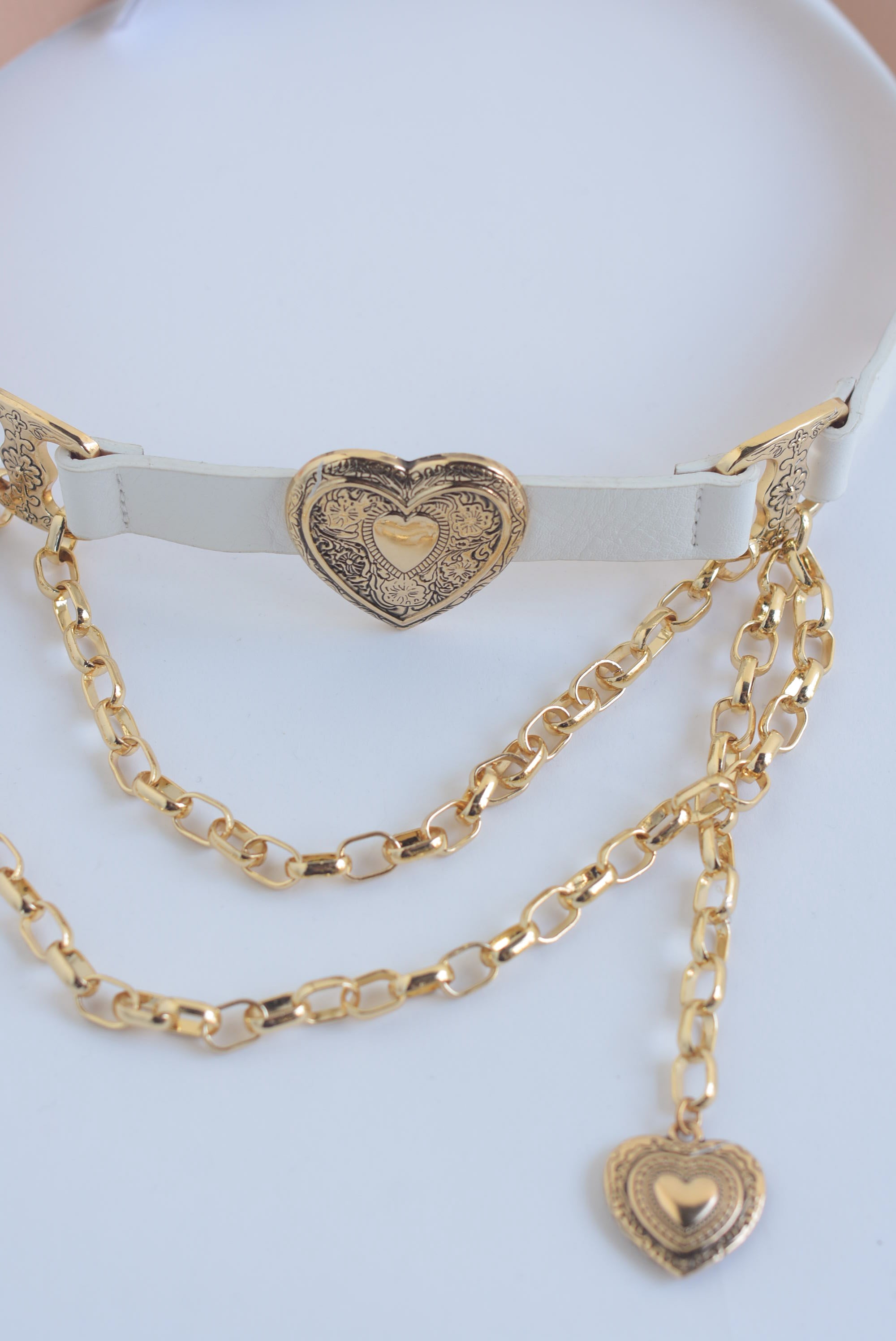 Cinturón vinipiel corazones y cadena