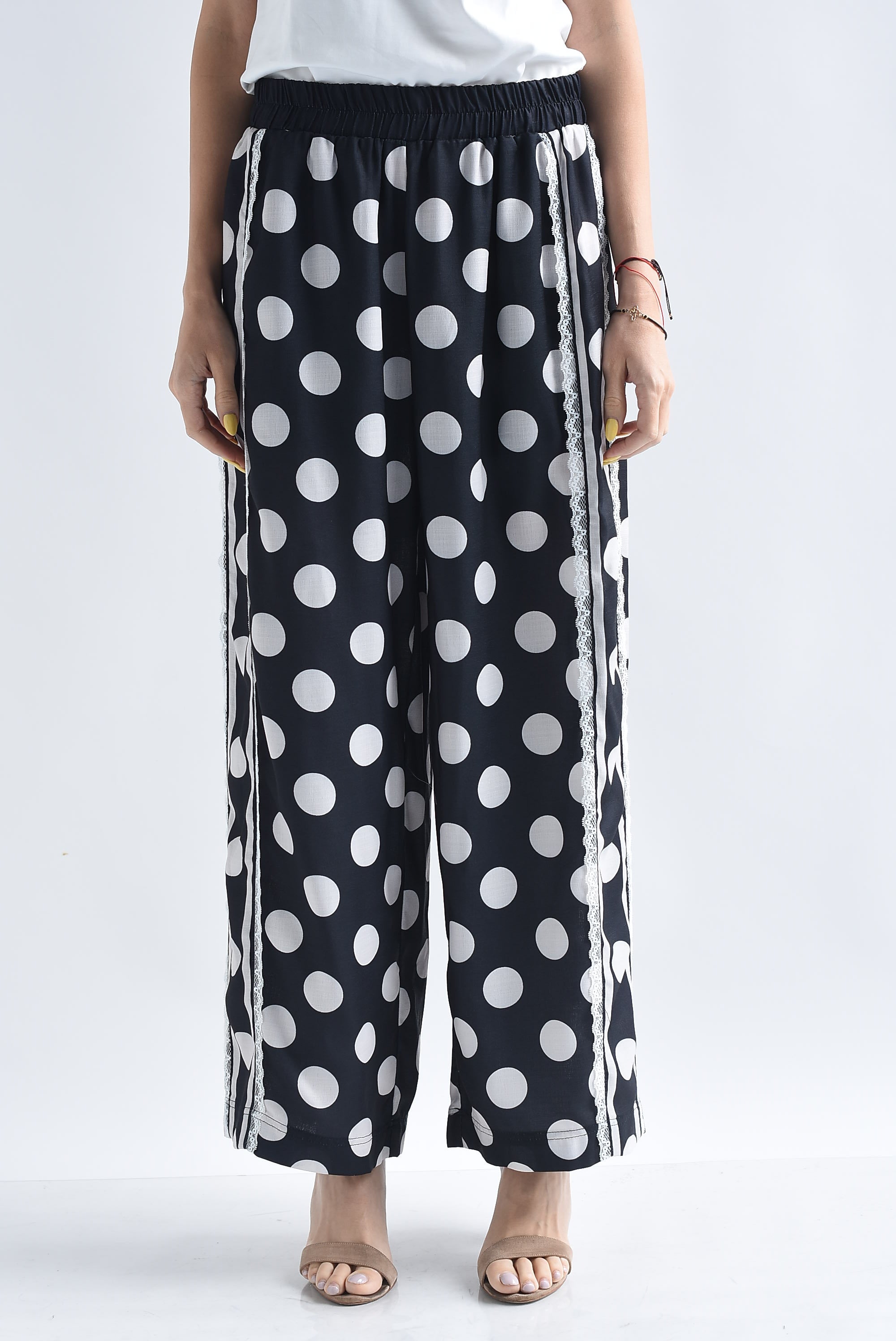 Pantalón polka dots track encaje