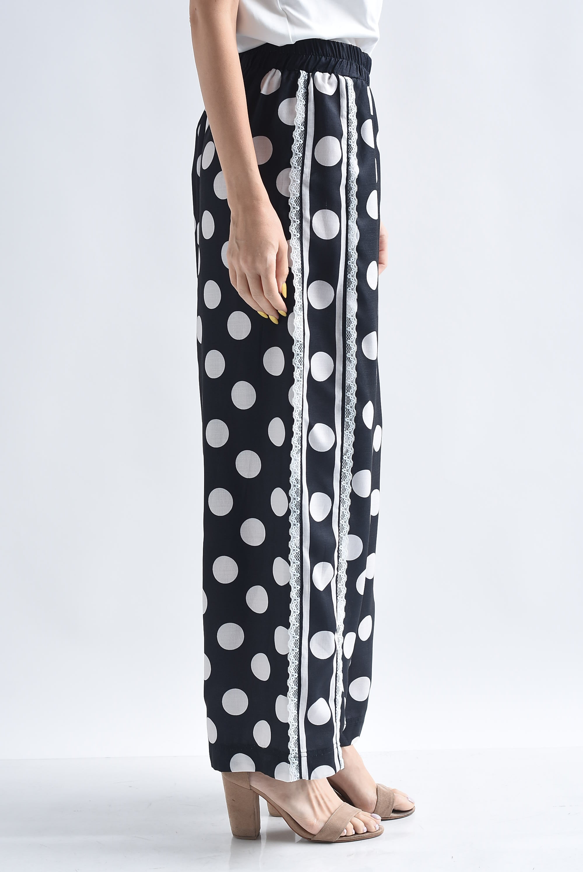 Pantalón polka dots track encaje