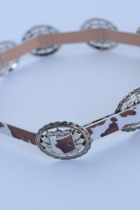 Fashion Styled Cinturón cruces en pétalos Cow